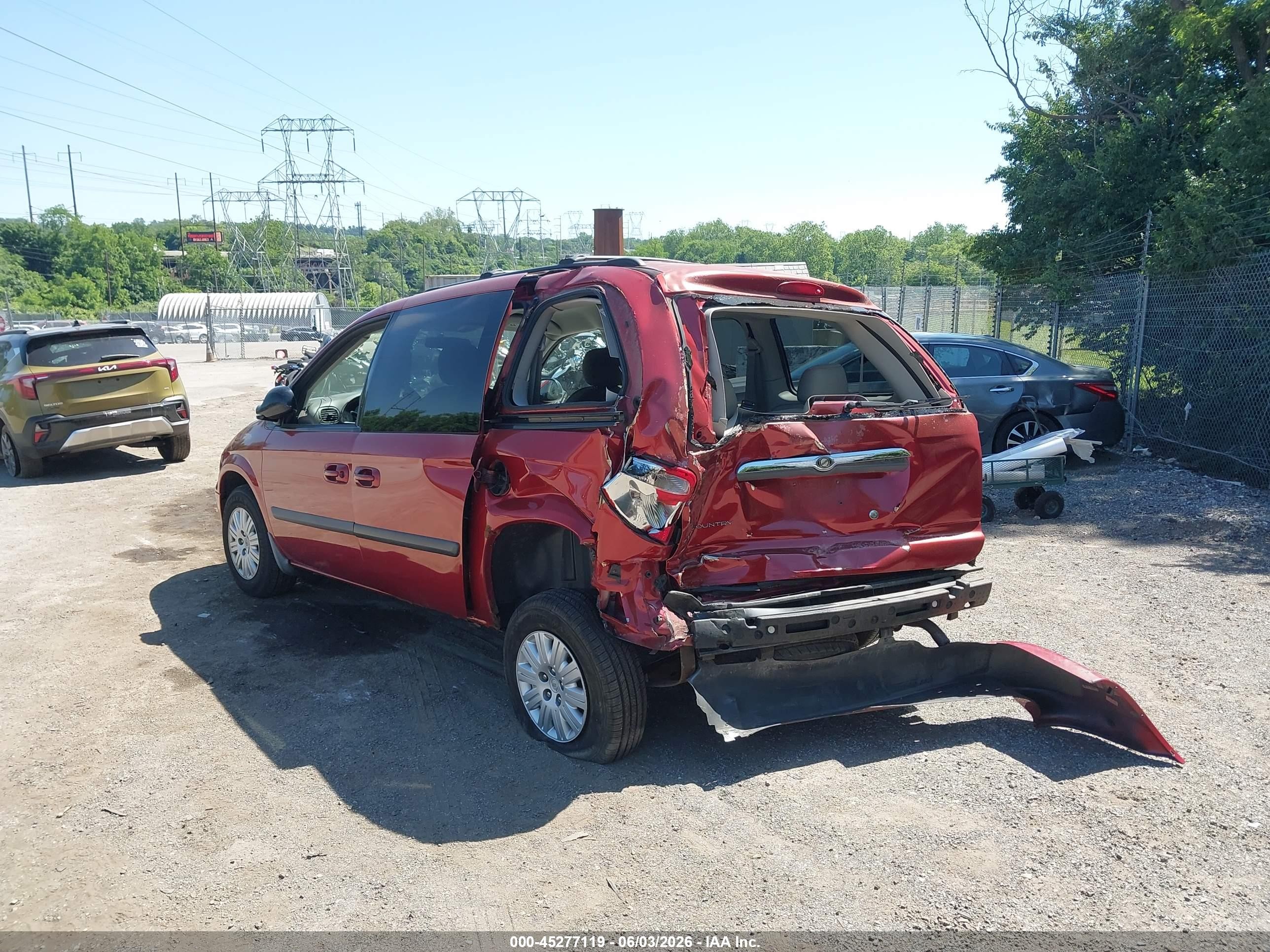 2007 Chrysler Town & Country   Red vin: 1A4GJ45R77B180354