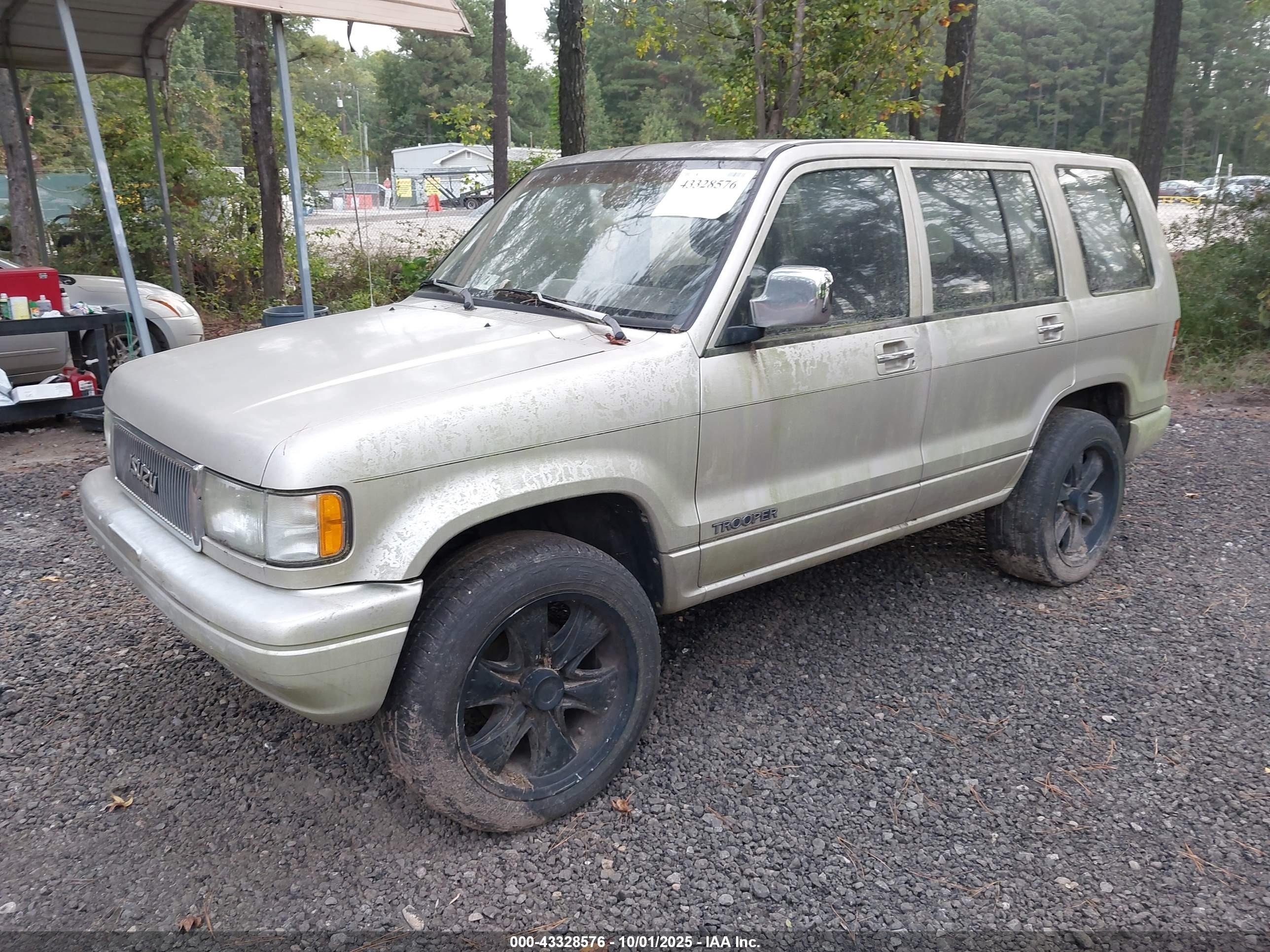 1999 Isuzu Trooper   Gold vin: 1ACDH58VXR7908045