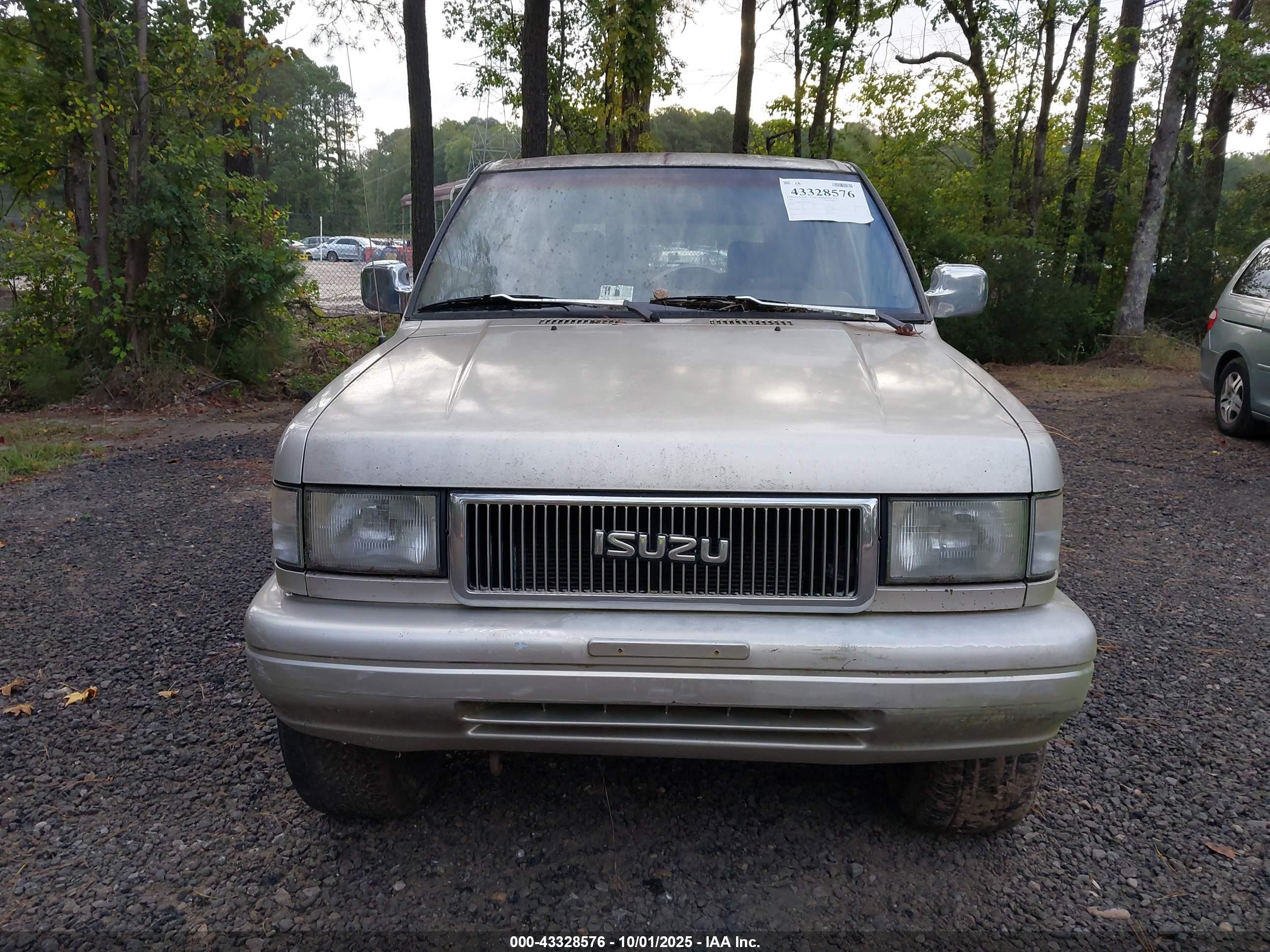 1999 Isuzu Trooper   Gold vin: 1ACDH58VXR7908045