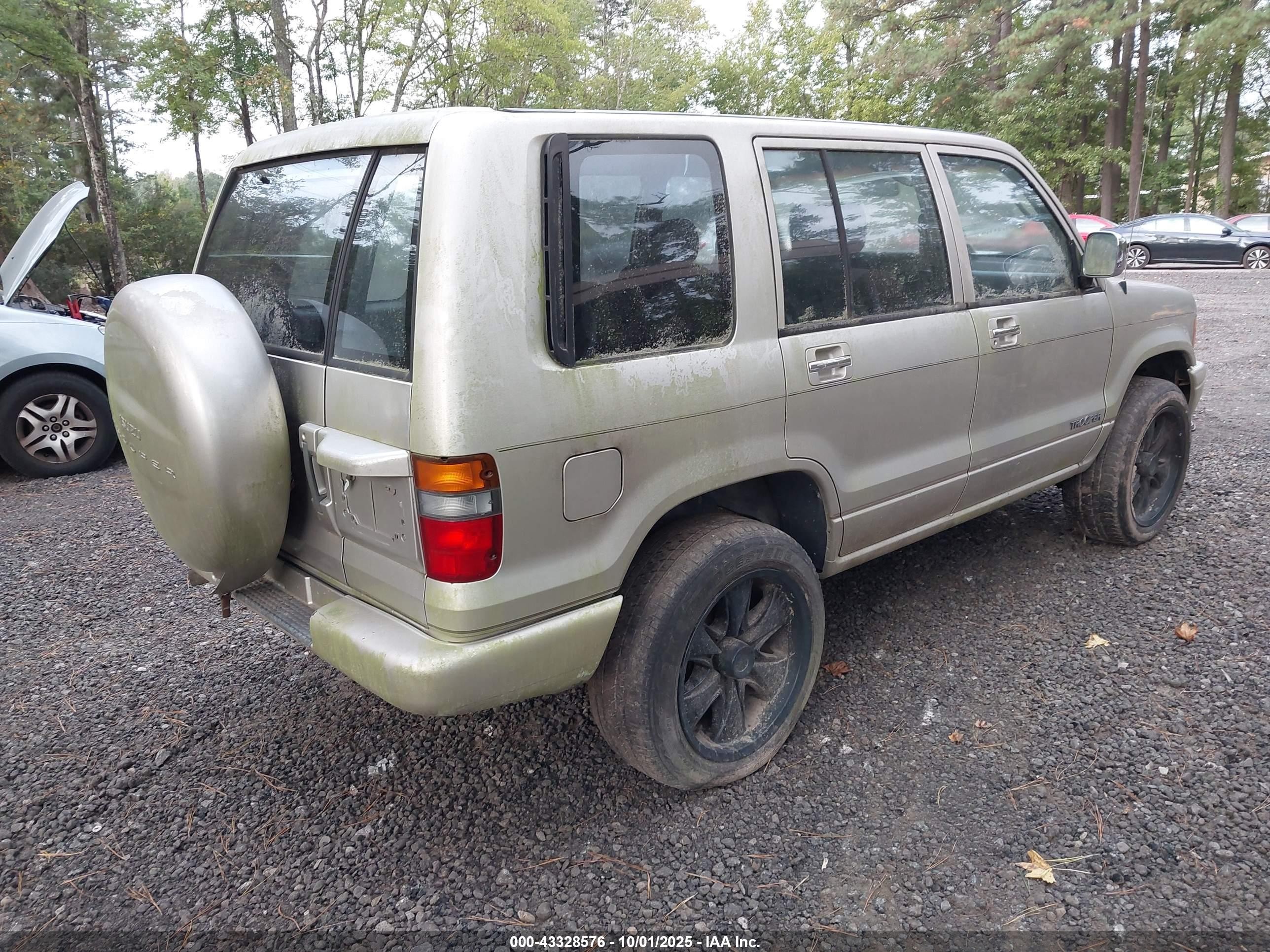 1999 Isuzu Trooper   Gold vin: 1ACDH58VXR7908045