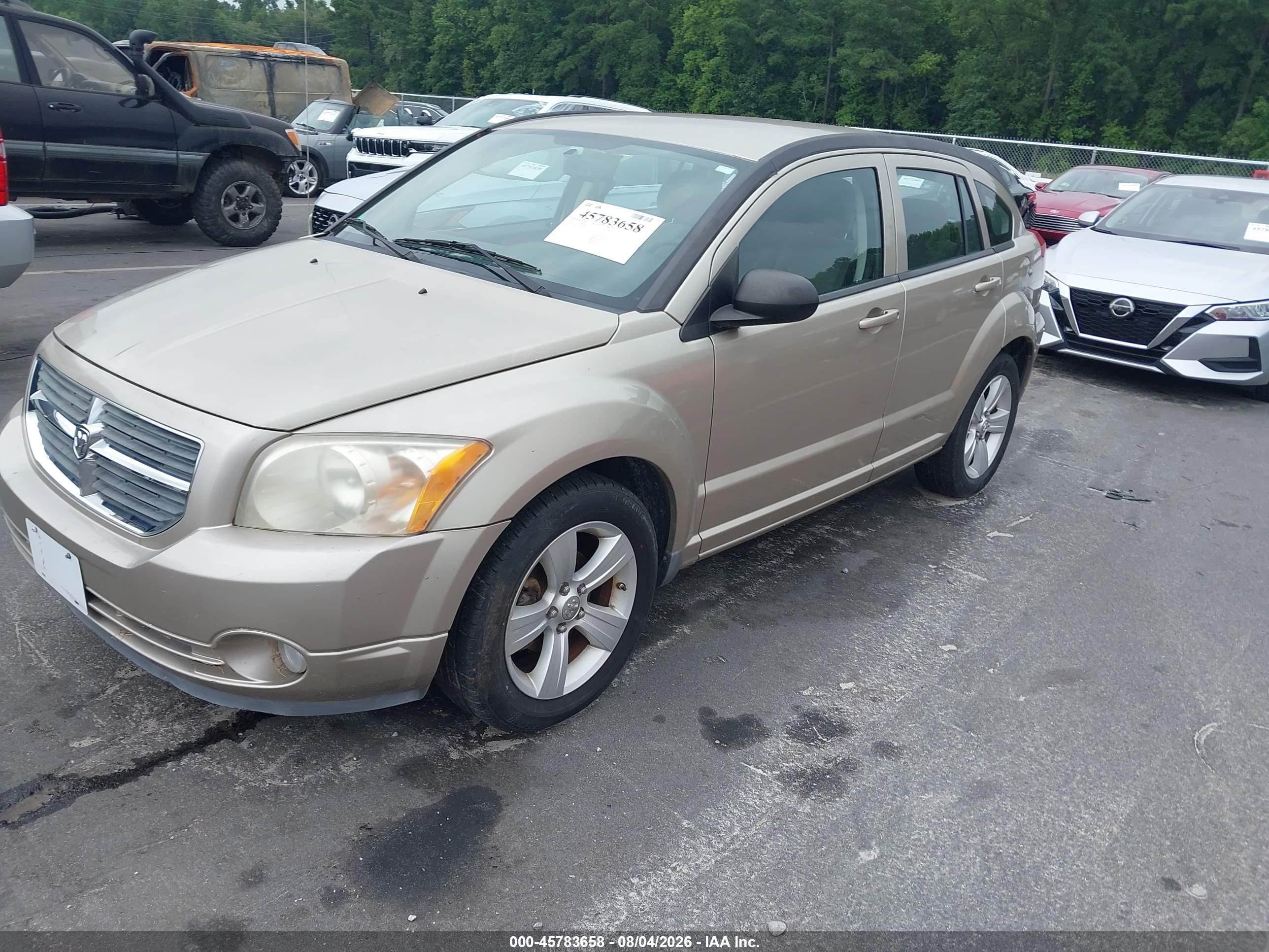 2010 Dodge Caliber Mainstreet Gold vin: 1B3CB3HA7AD568652