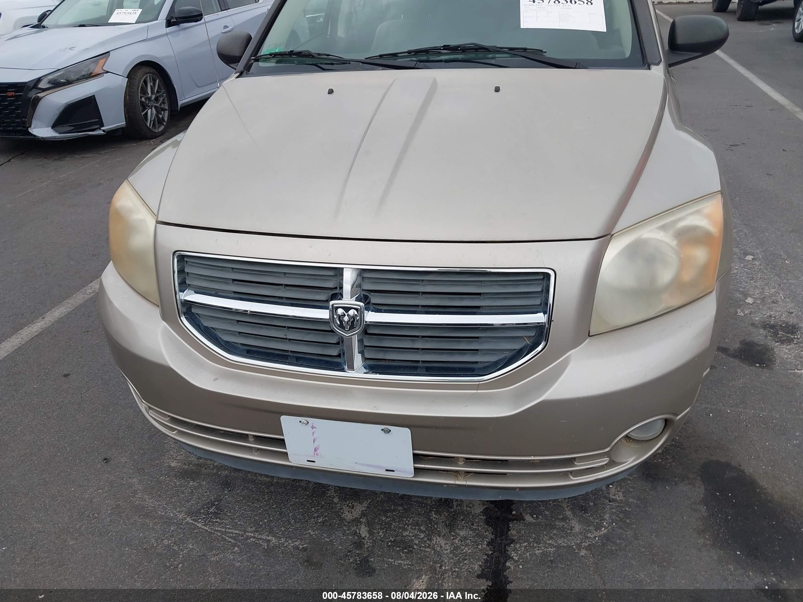 2010 Dodge Caliber Mainstreet Gold vin: 1B3CB3HA7AD568652
