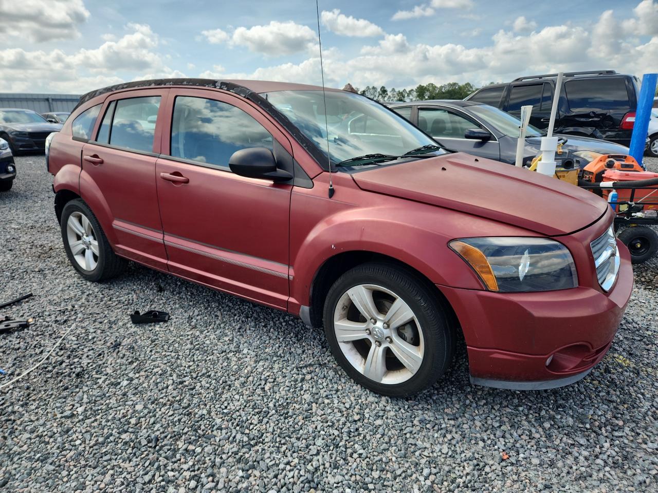 2010 Dodge Caliber Mainstreet Burgundy vin: 1B3CB3HA9AD639060