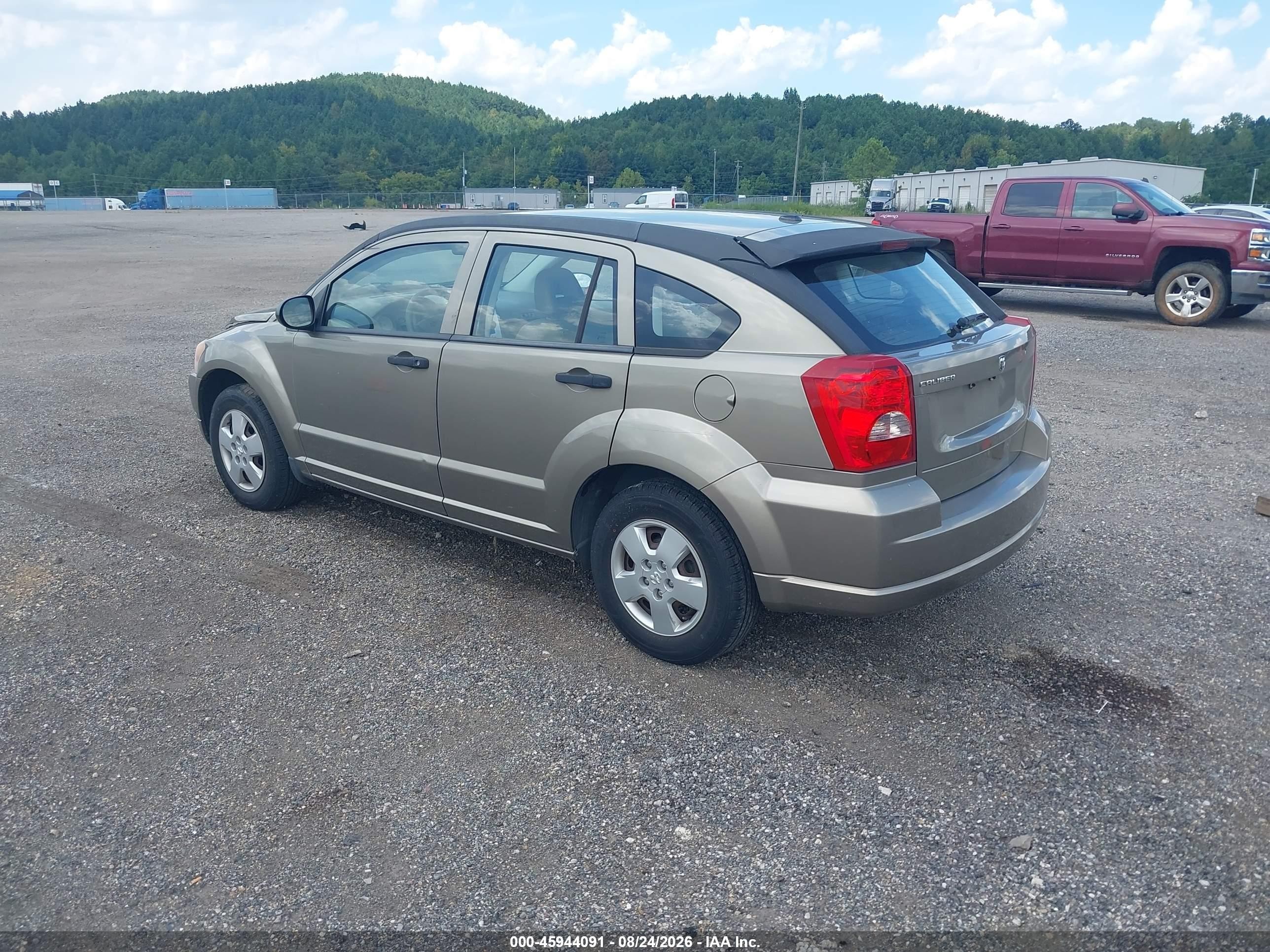 2007 Dodge Caliber   Tan vin: 1B3HB28B07D194337