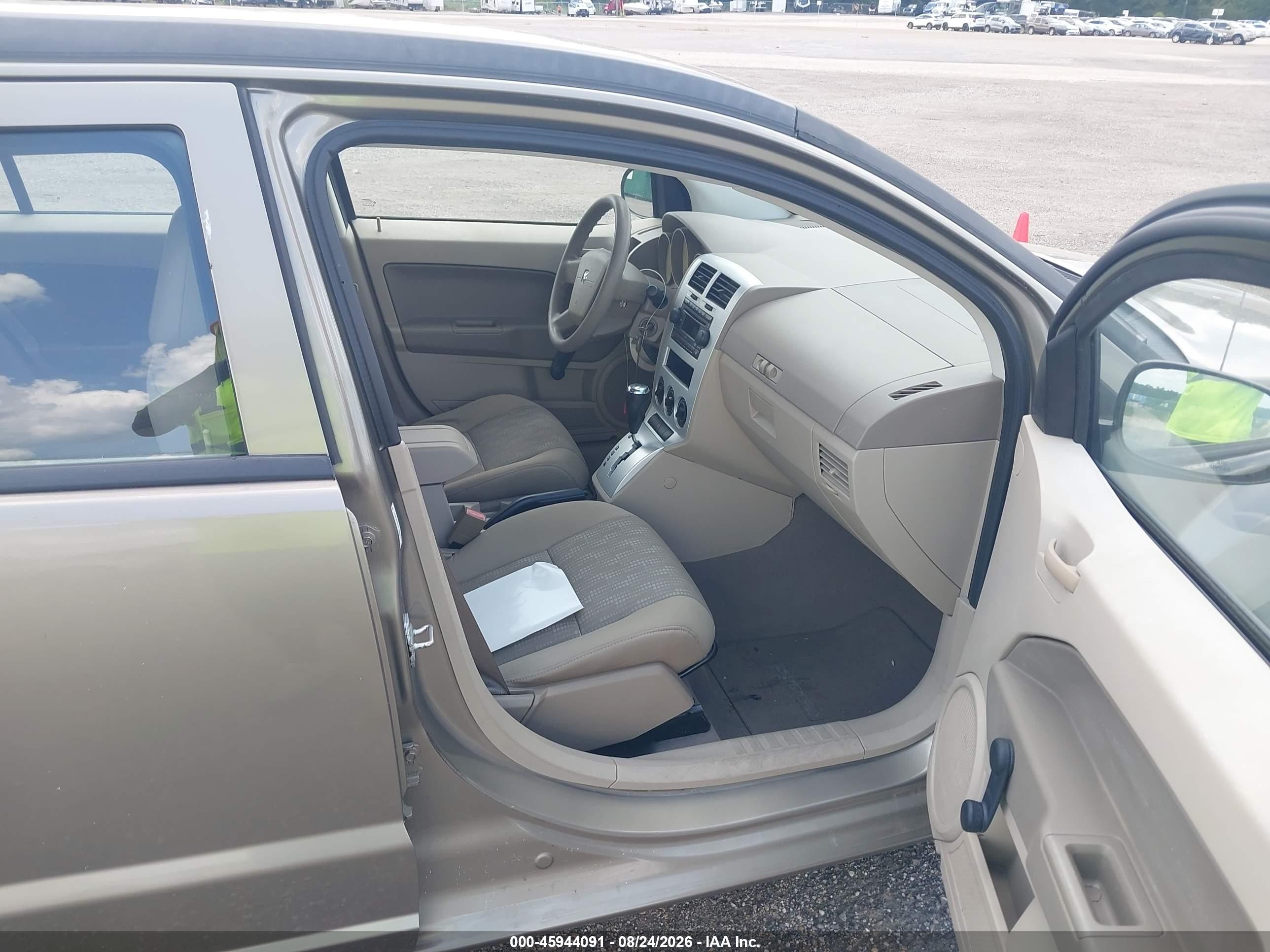 2007 Dodge Caliber   Tan vin: 1B3HB28B07D194337