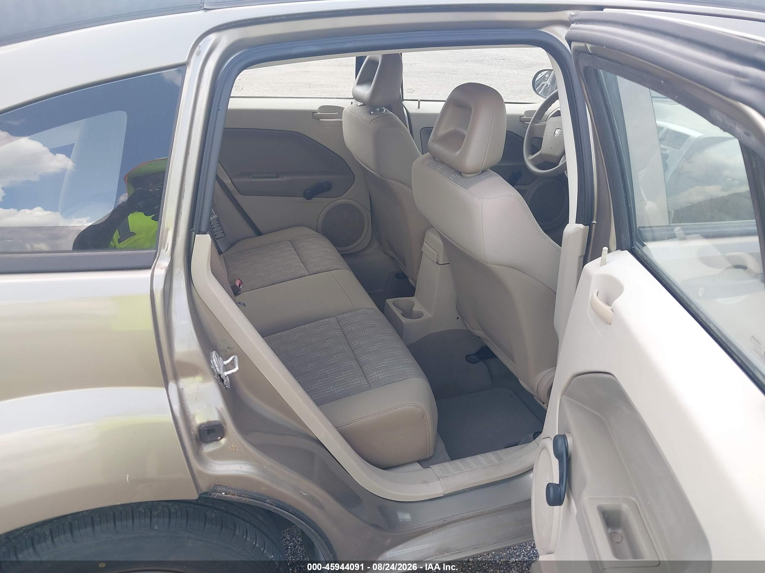 2007 Dodge Caliber   Tan vin: 1B3HB28B07D194337