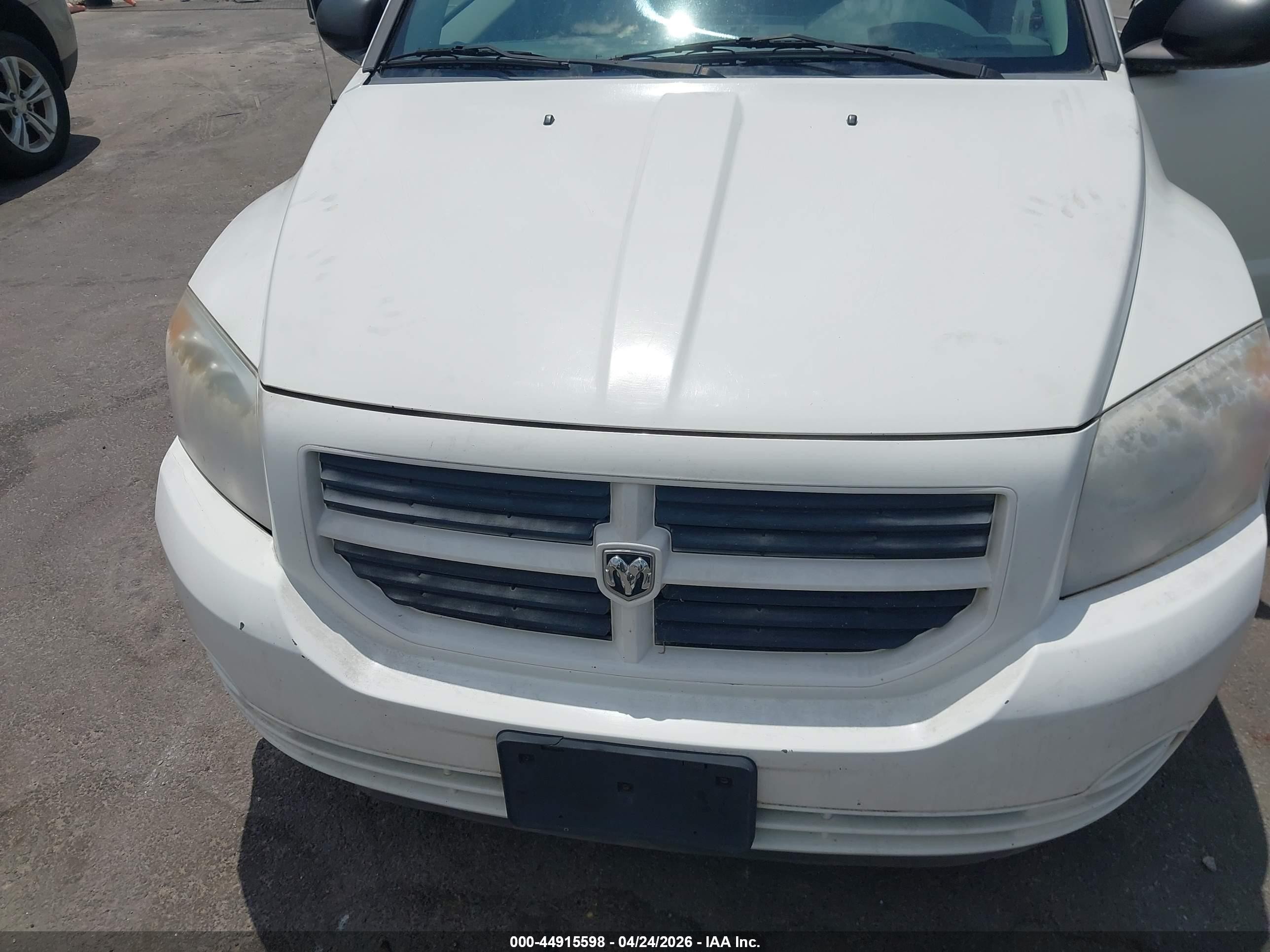 2007 Dodge Caliber   White vin: 1B3HB28B67D177123