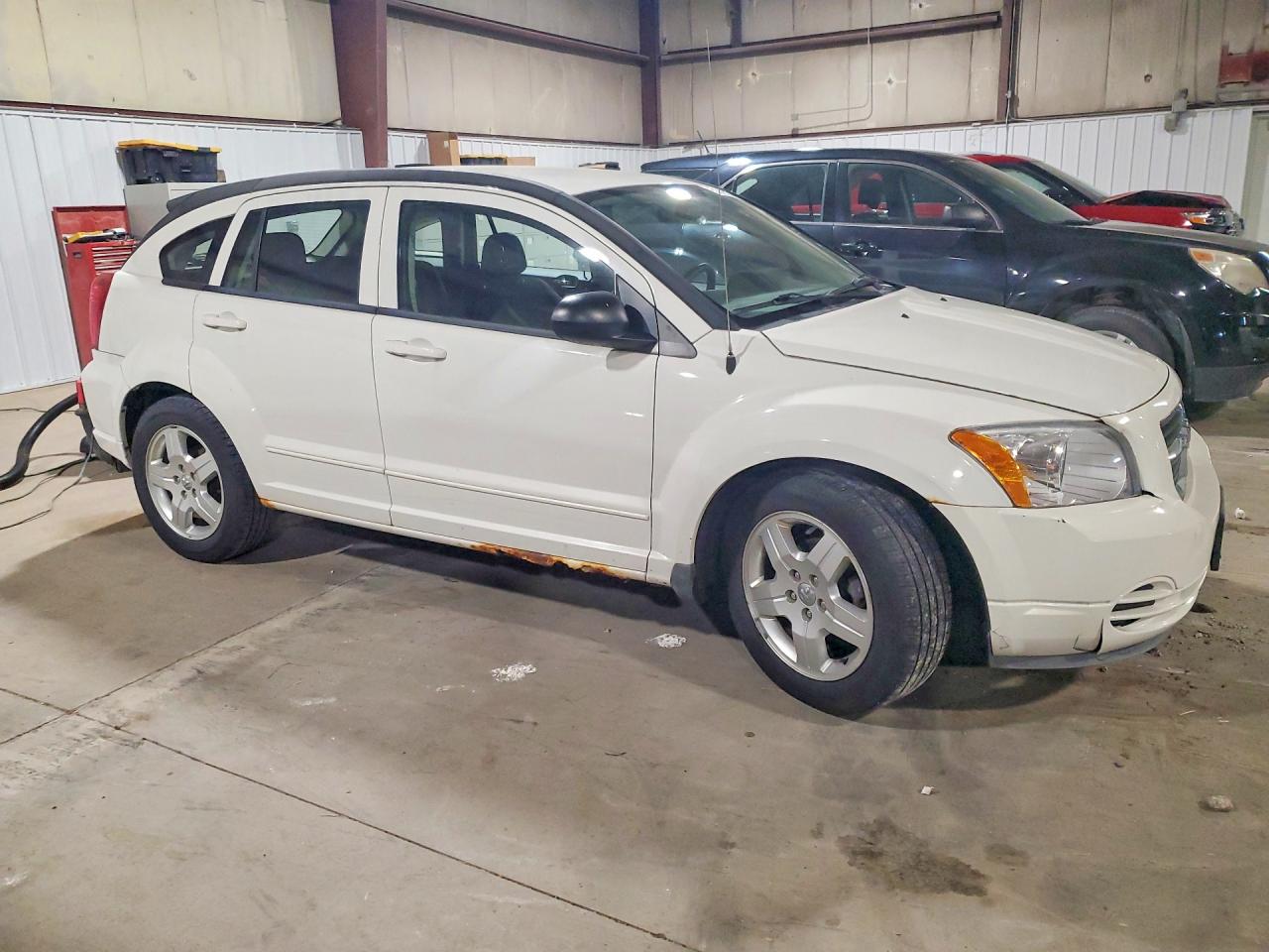2009 Dodg Caliber White vin: 1B3HB48A09D147850
