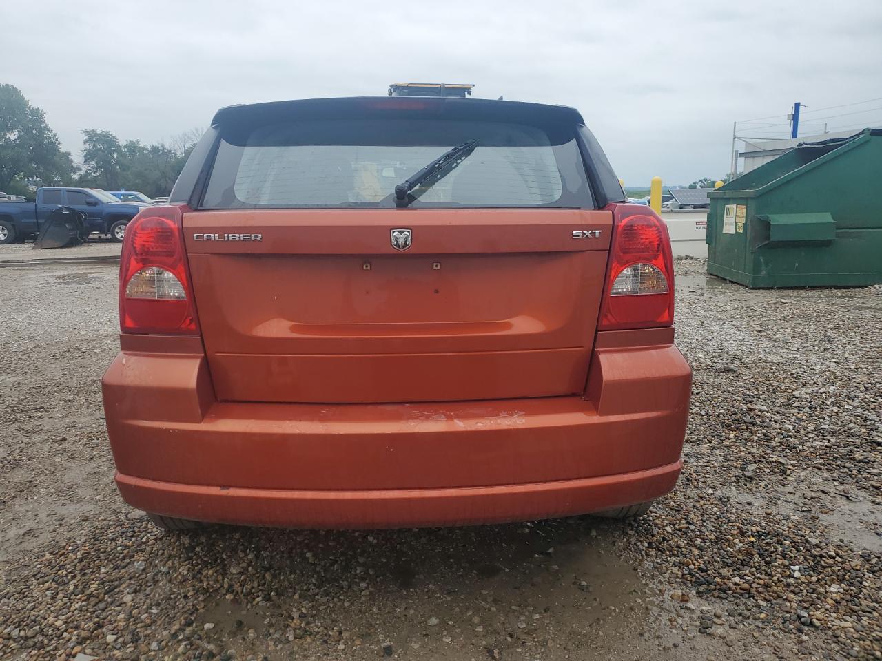2007 Dodge Caliber Sxt Orange vin: 1B3HB48B67D259610 Damage: Rear Bumper/Cover, Peeling, > 12 Inches