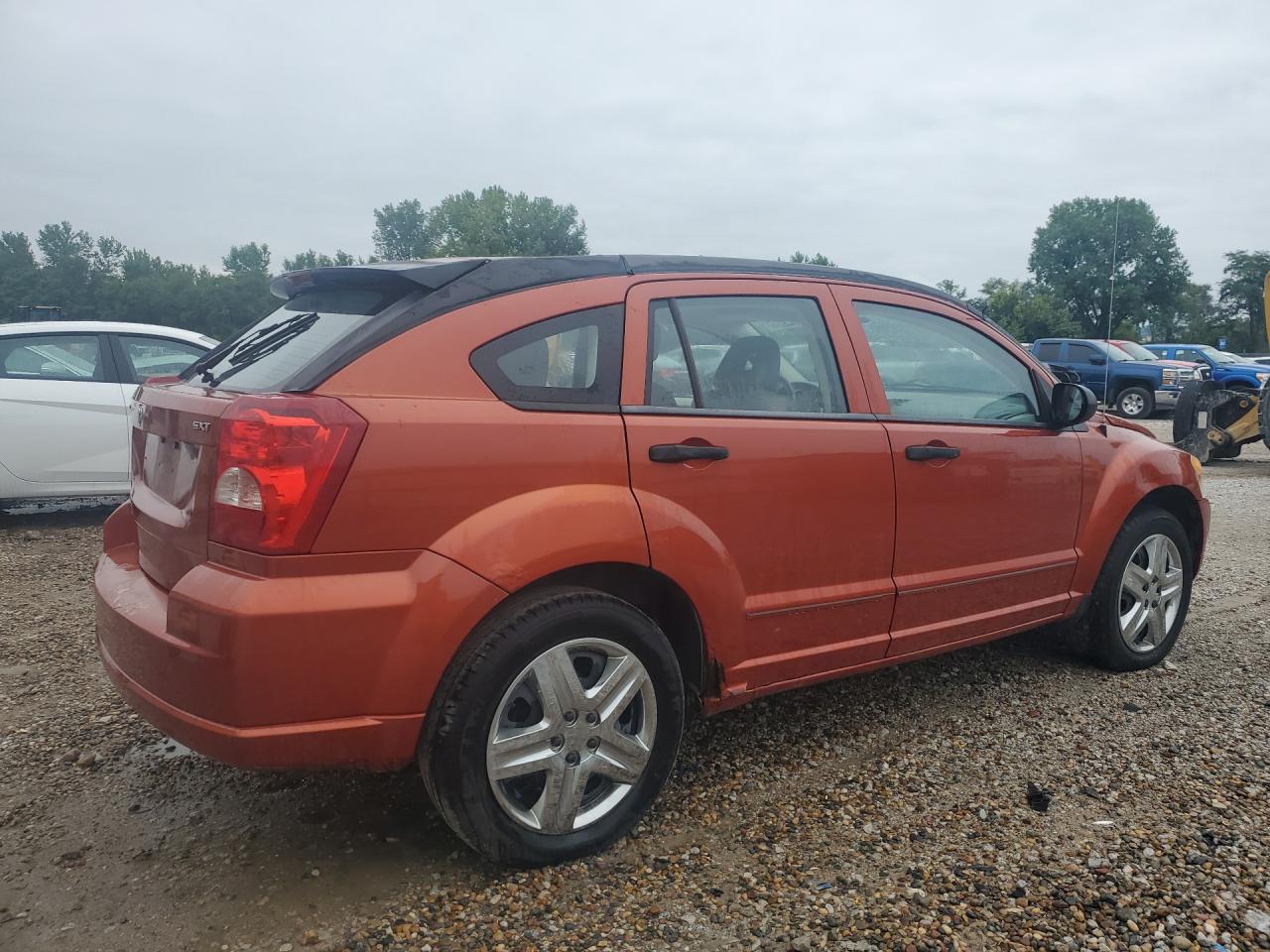 2007 Dodge Caliber Sxt Orange vin: 1B3HB48B67D259610 Damage: Right Rear Door Cladding, Broken, Replacement Required