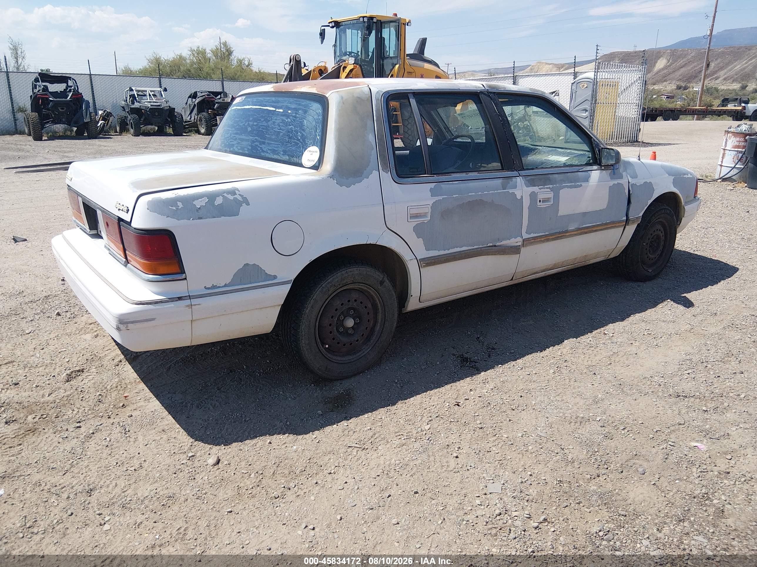 1991 Dodge Spirit   White vin: 1B3XA46K6MF669552