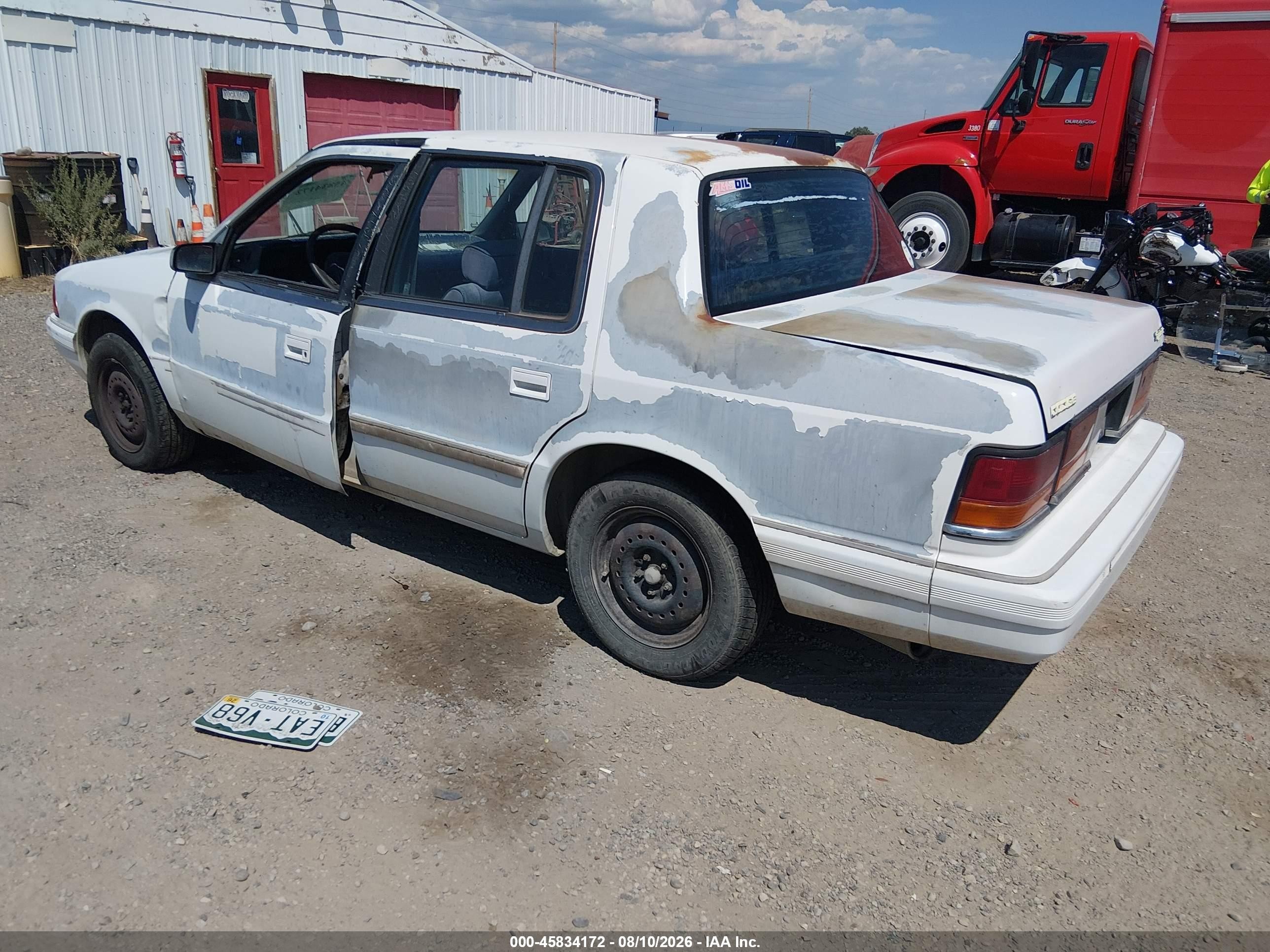 1991 Dodge Spirit   White vin: 1B3XA46K6MF669552