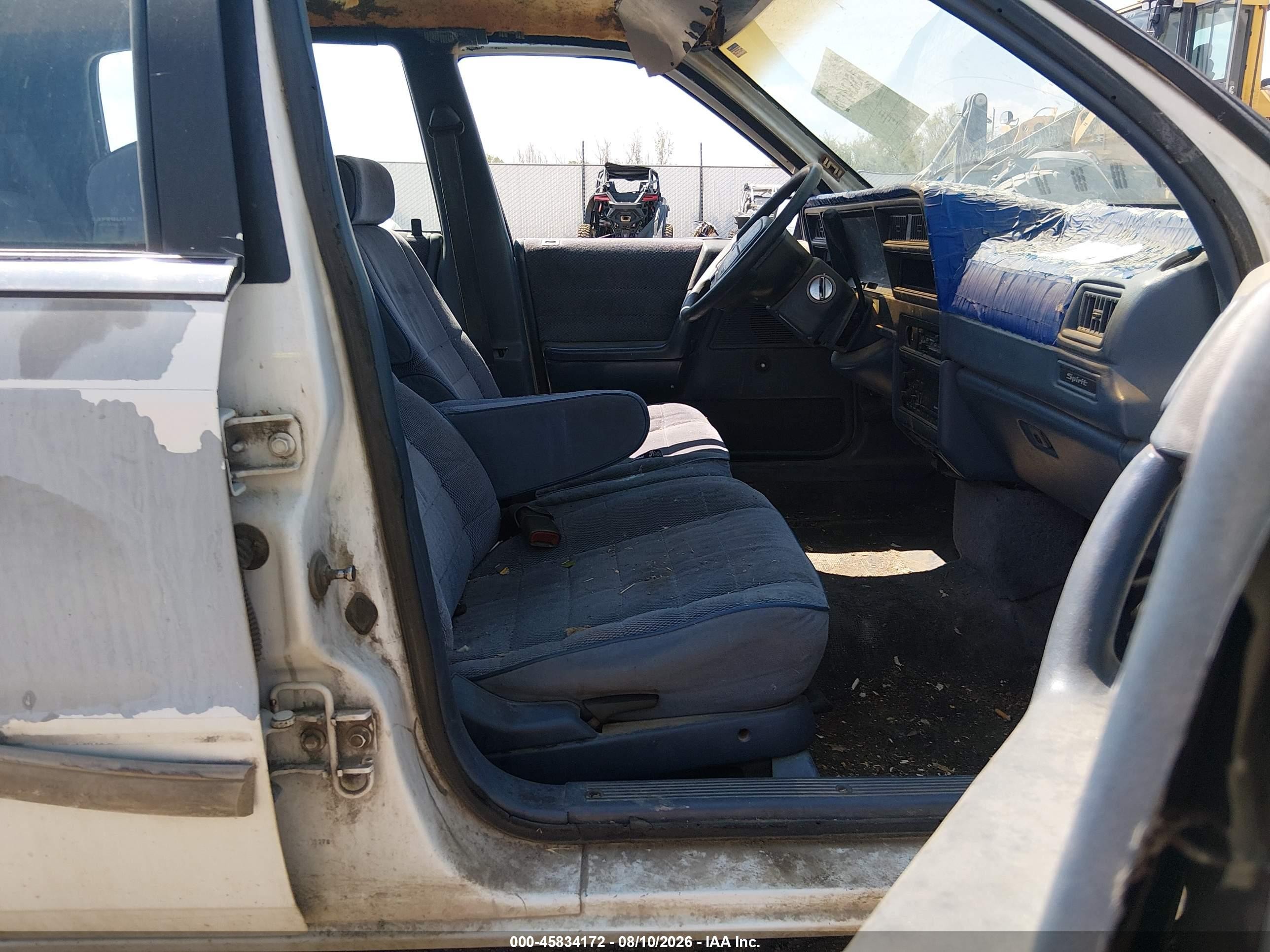 1991 Dodge Spirit   White vin: 1B3XA46K6MF669552