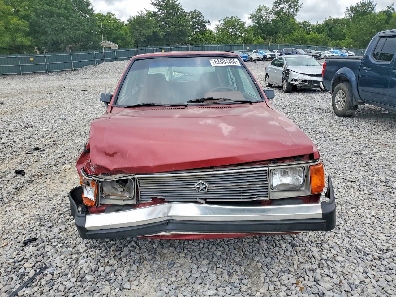 1990 Dodge Omni Expo Maroon vin: 1B3XL18D8LC730052