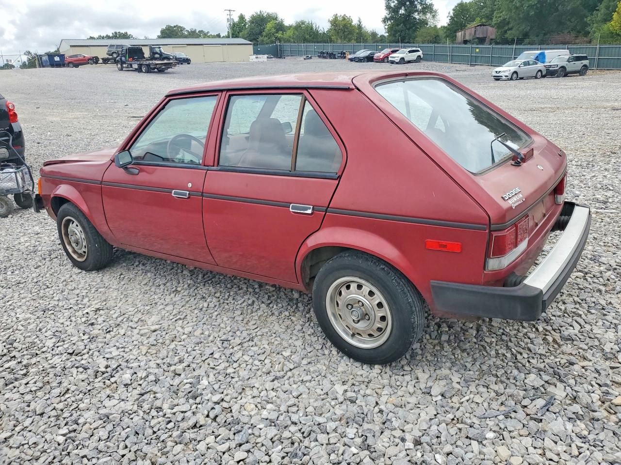 1990 Dodge Omni Expo Maroon vin: 1B3XL18D8LC730052