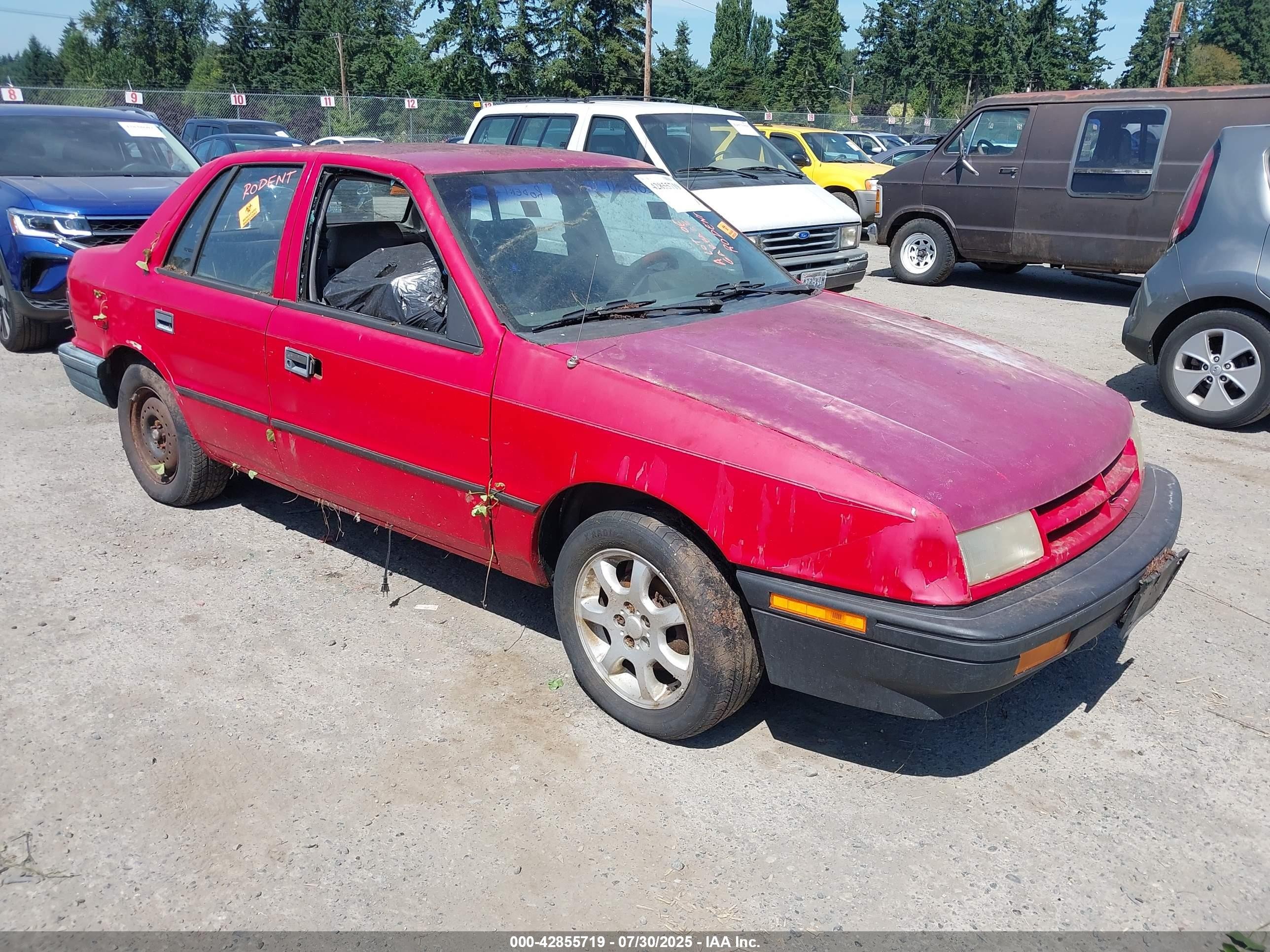 1991 Dodge Shadow   Red vin: 1B3XP48K6MN521659