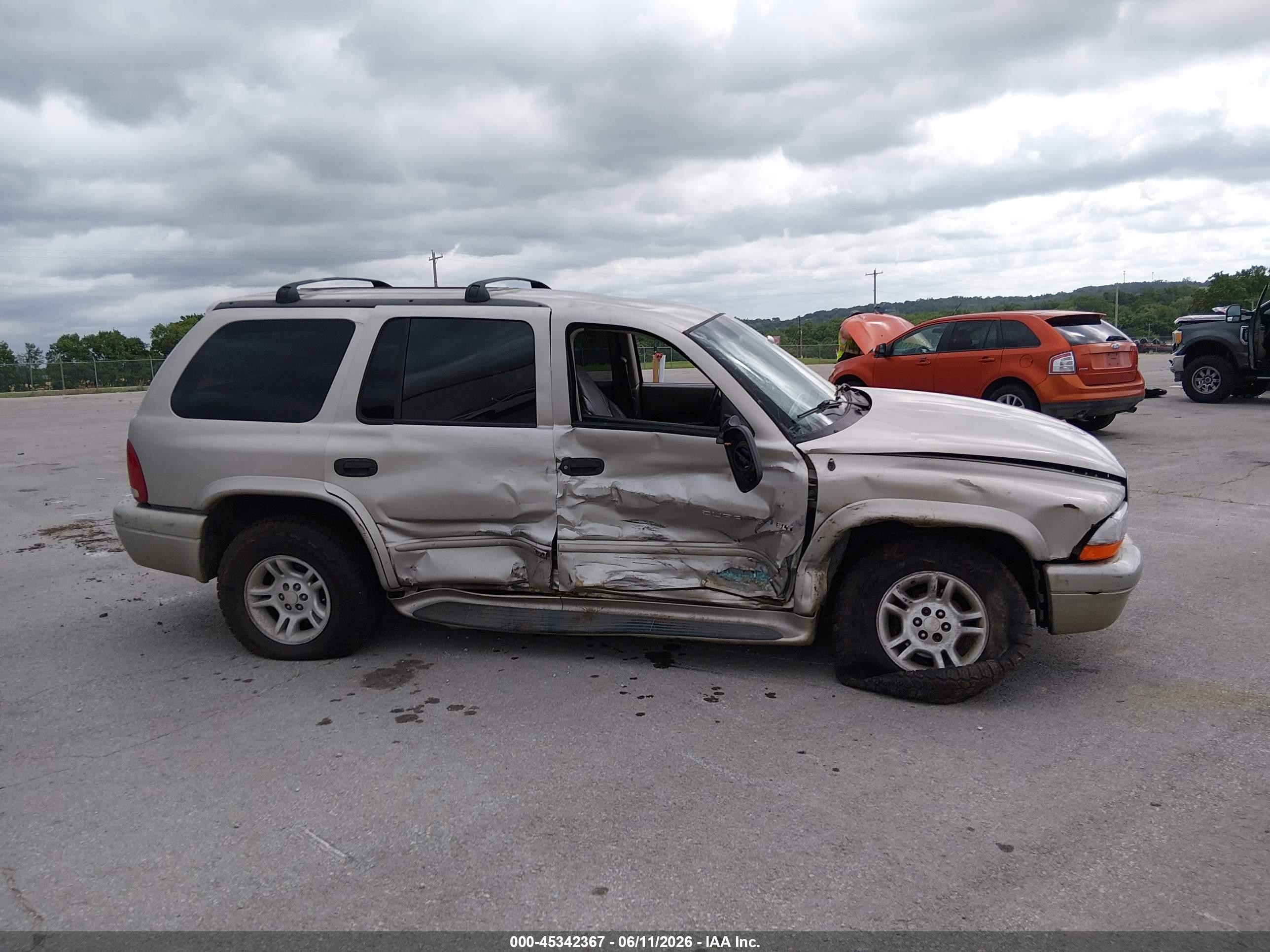 2001 Dodge Durango   Gold vin: 1B4HS28N11F544723