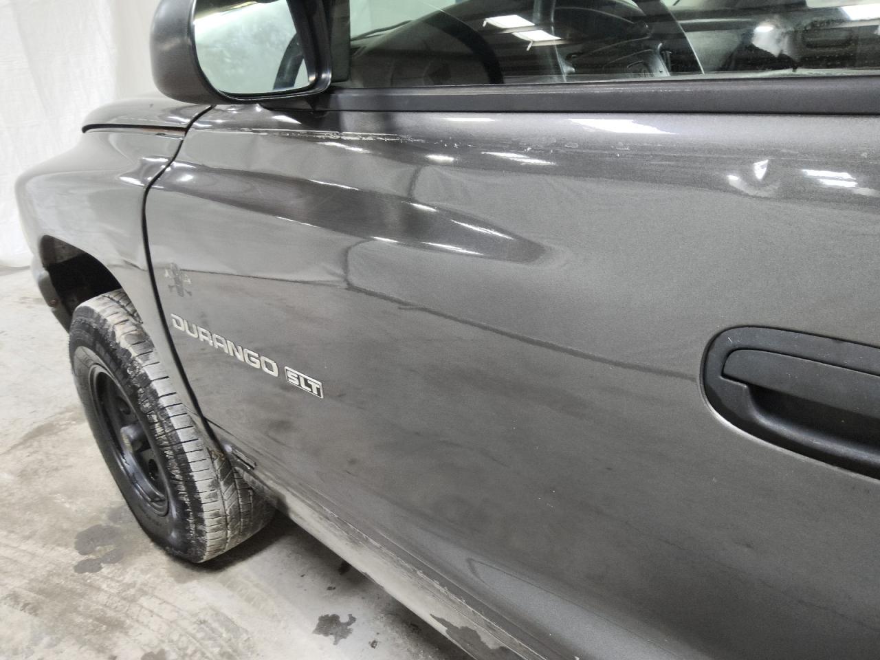2001 Dodge Durango Silver vin: 1B4HS28N11F620067 Damage: Left Front Door, Dent(S) W/ Paint Dmg, 5 To 6 Inches