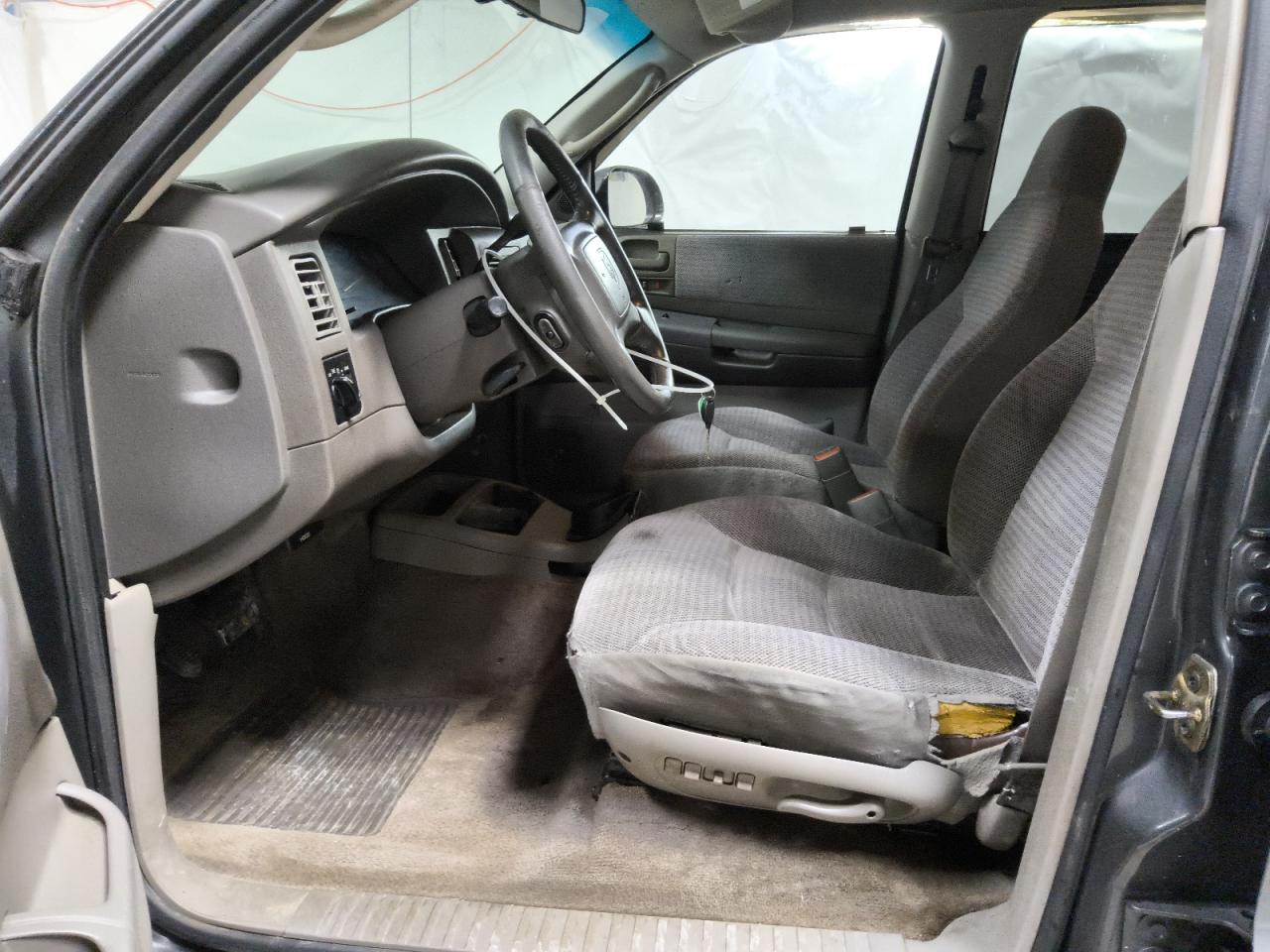 2001 Dodge Durango Silver vin: 1B4HS28N11F620067 Damage: Left Front Seat, Torn, 7 To 8 Inches