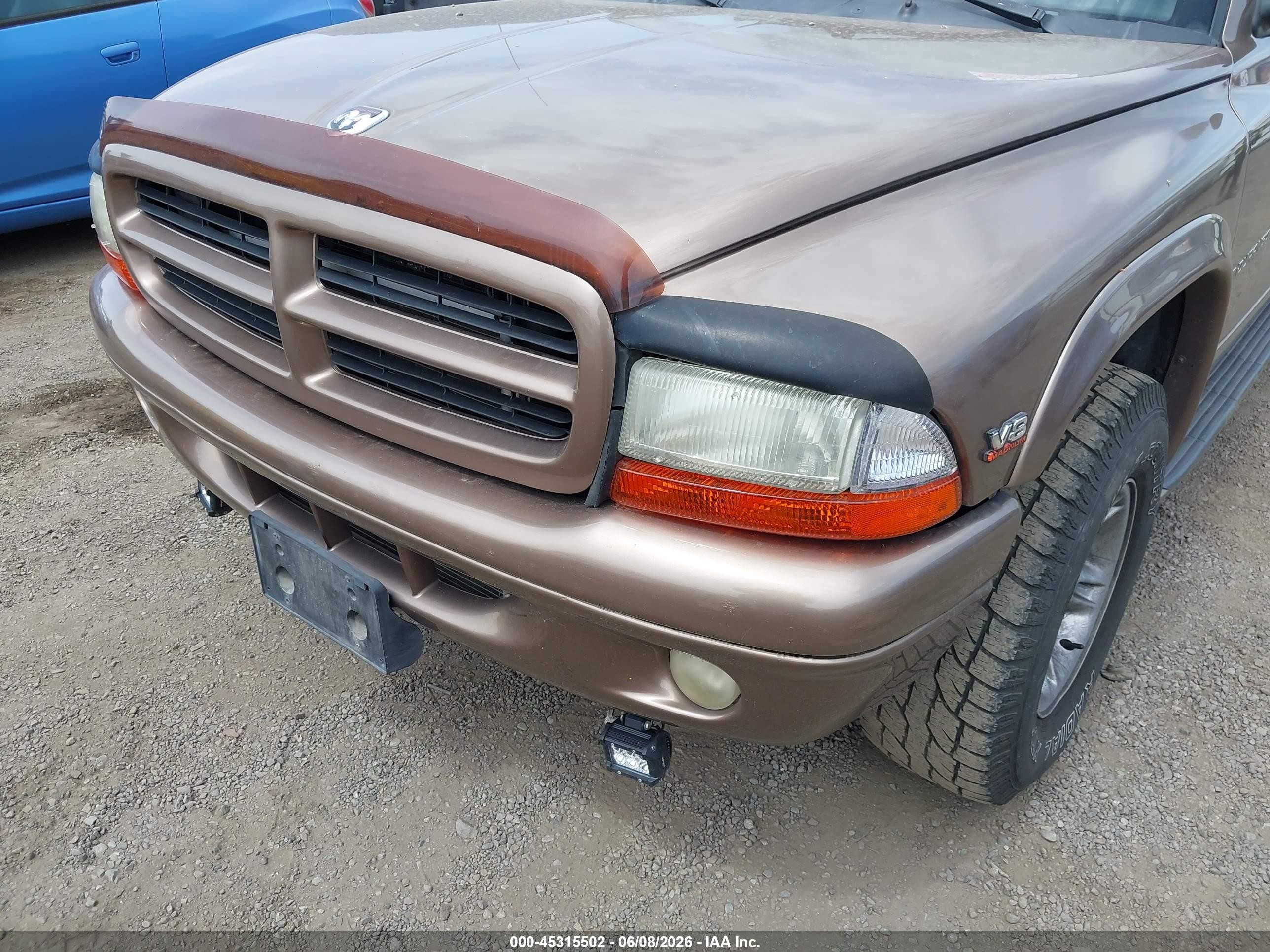 2000 Dodge Durango   Brown vin: 1B4HS28N5YF258576