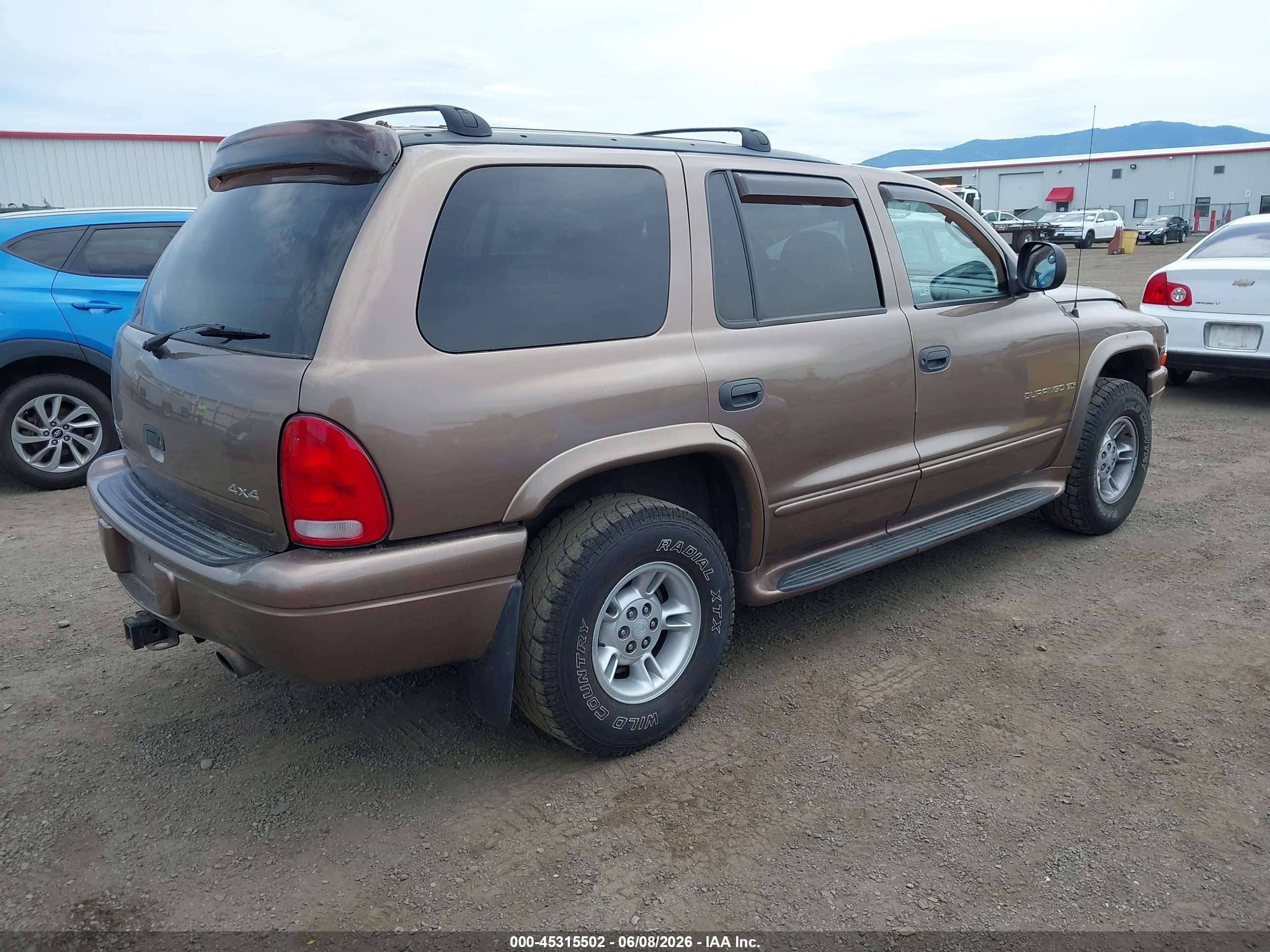 2000 Dodge Durango   Brown vin: 1B4HS28N5YF258576