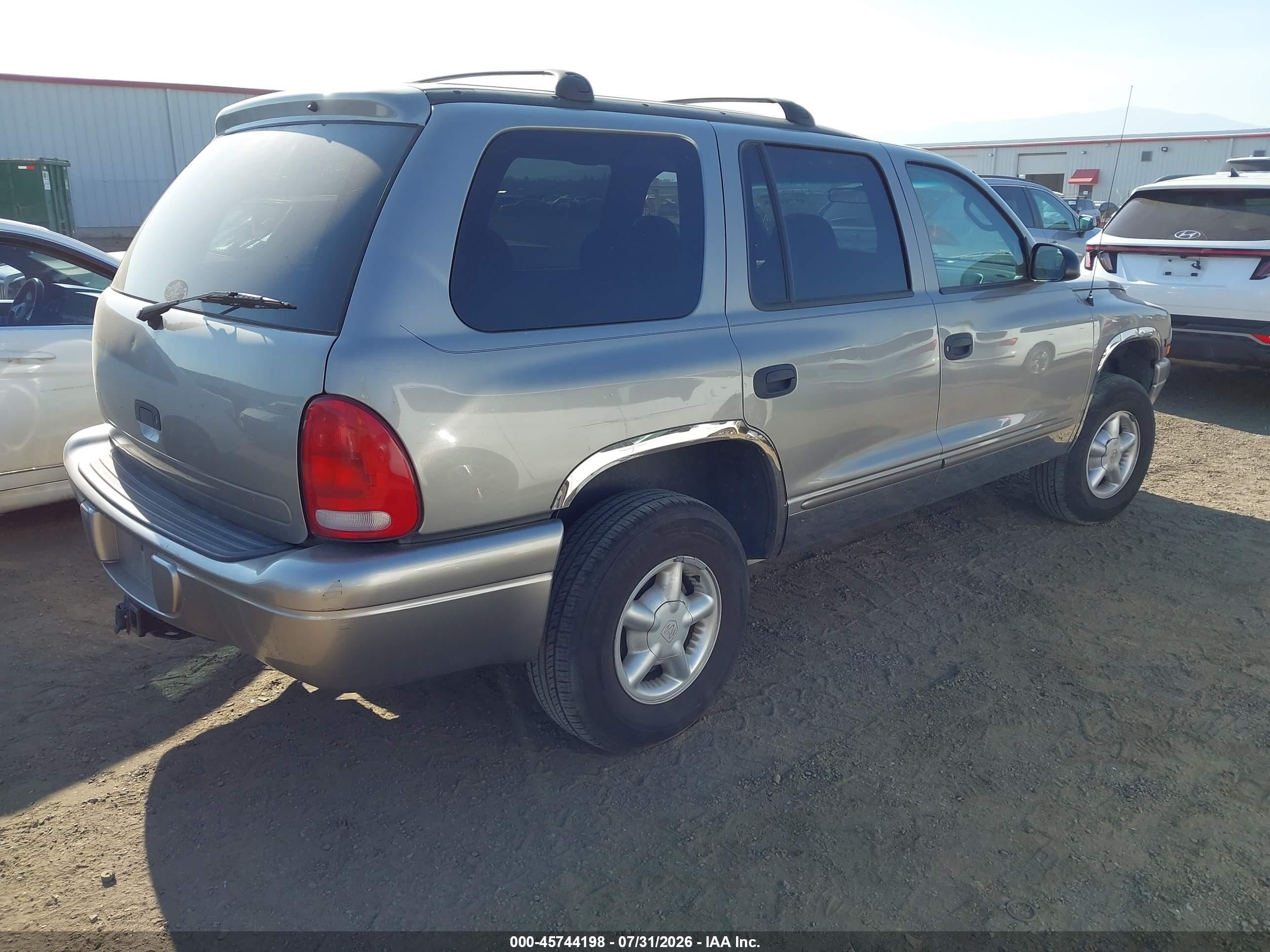 2000 Dodge Durango   Gold vin: 1B4HS28N8YF236149