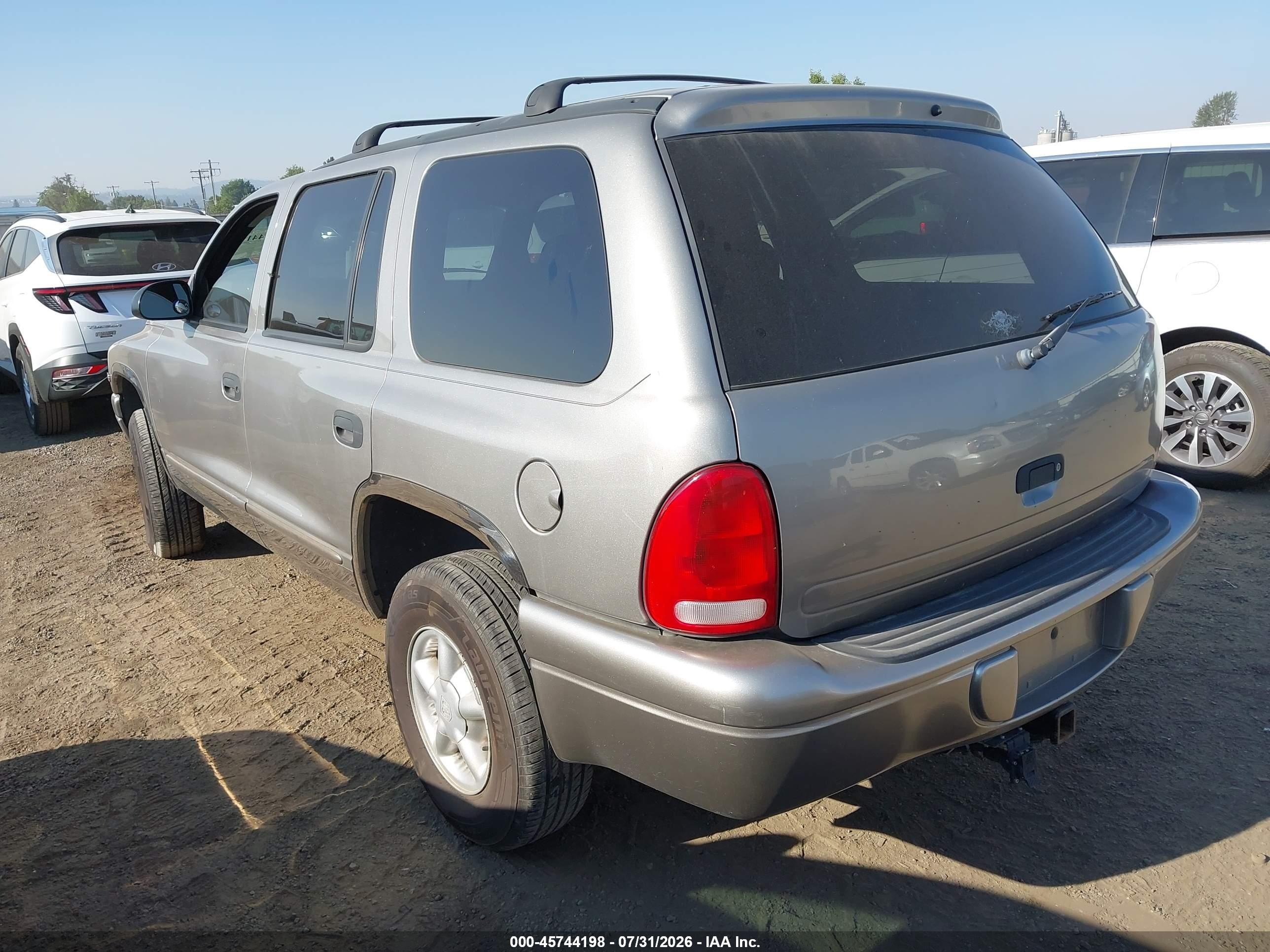 2000 Dodge Durango   Gold vin: 1B4HS28N8YF236149