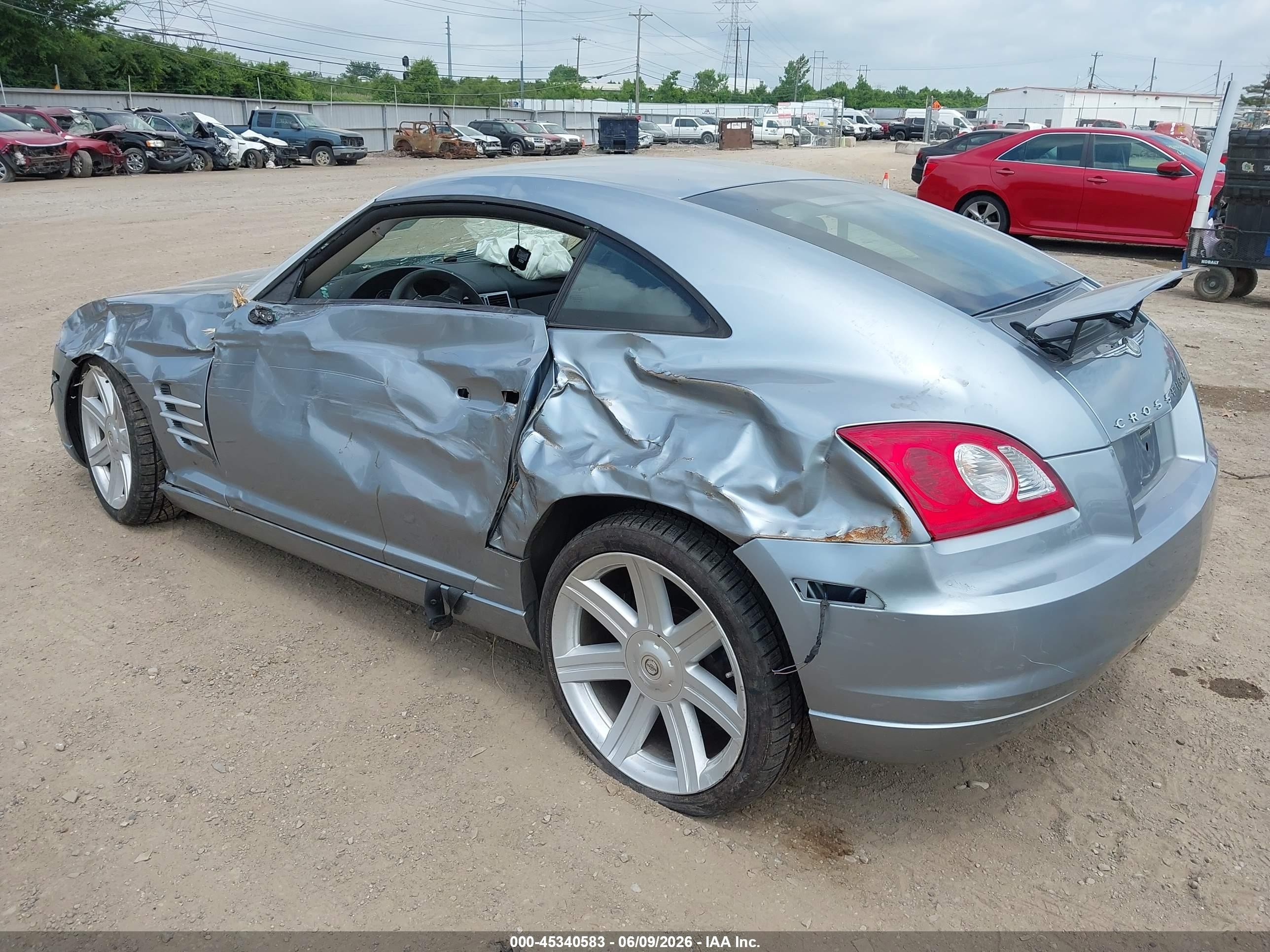 2004 Chrysler Crossfire   Silver vin: 1C3AN69L24X002680