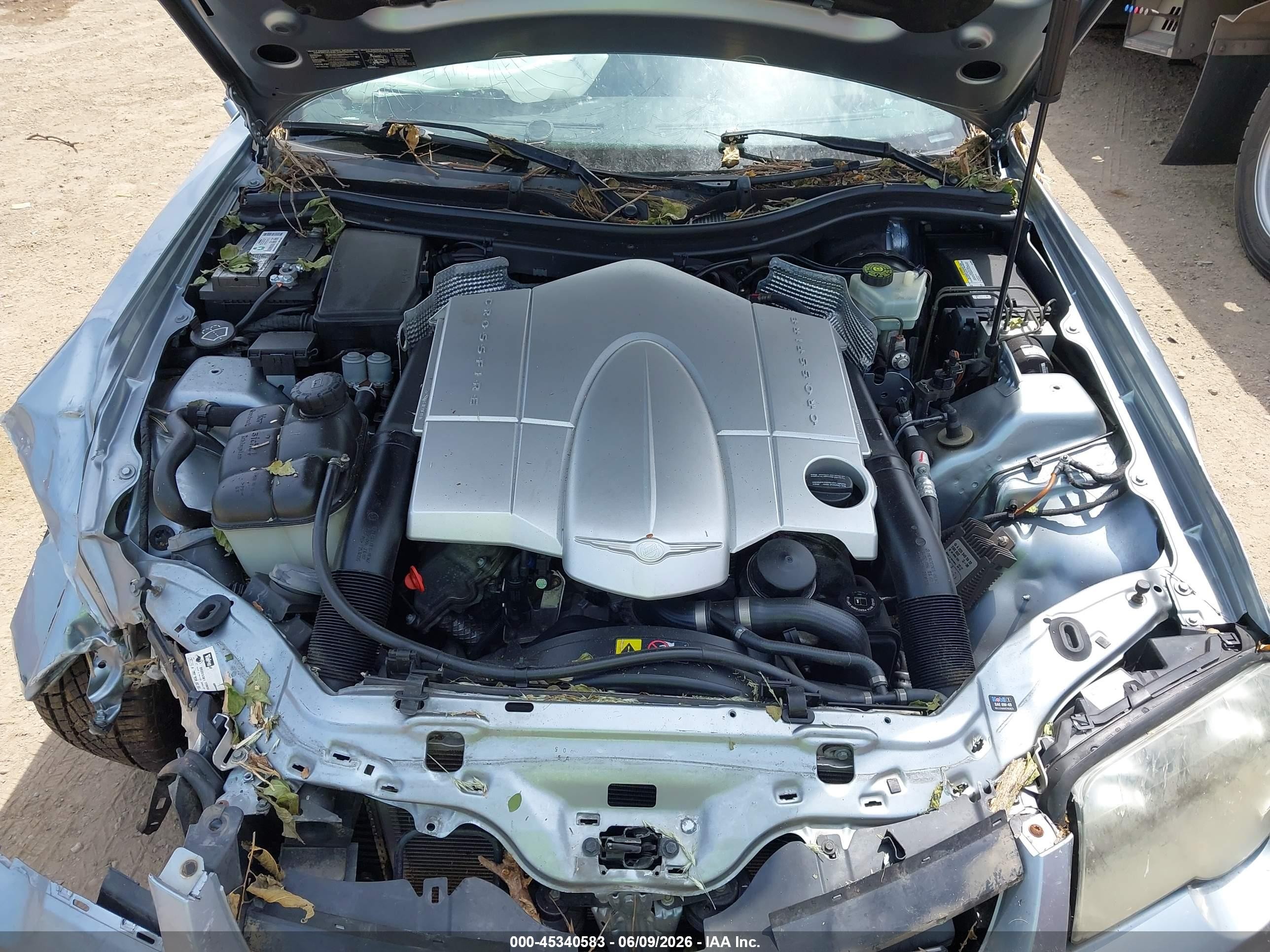 2004 Chrysler Crossfire   Silver vin: 1C3AN69L24X002680