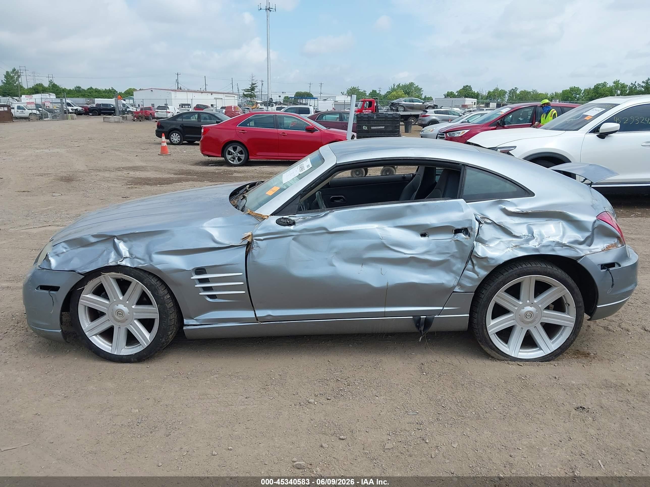 2004 Chrysler Crossfire   Silver vin: 1C3AN69L24X002680