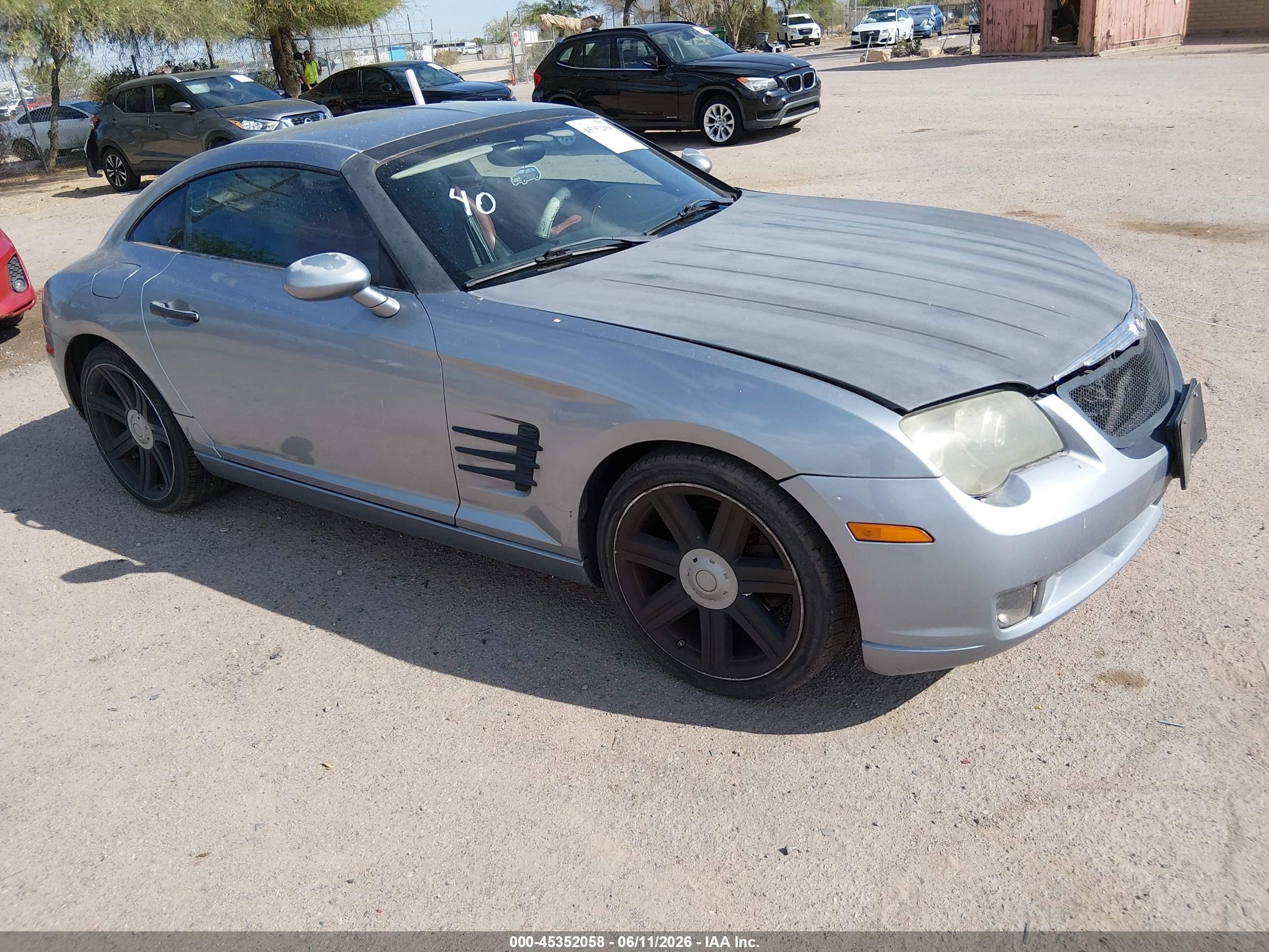 2004 Chrysler Crossfire   Silver vin: 1C3AN69L94X022893