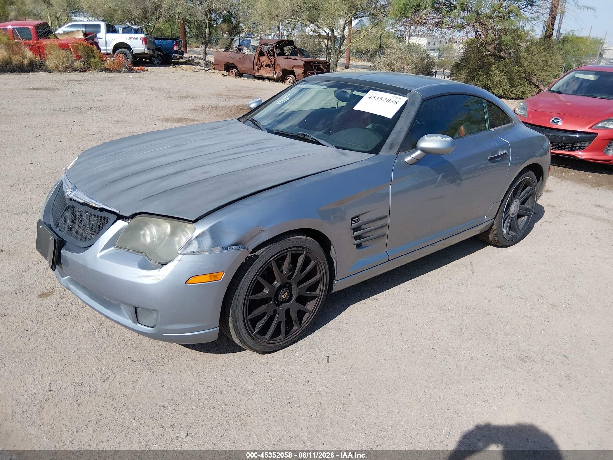 2004 Chrysler Crossfire   Silver vin: 1C3AN69L94X022893