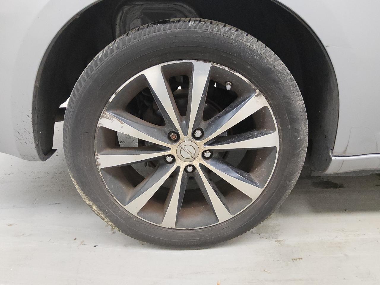 2013 Chrysler 200 Touring Silver vin: 1C3CCBBB8DN516019 Damage: Right Rear Wheel, Curb Rash, > 12 Inches