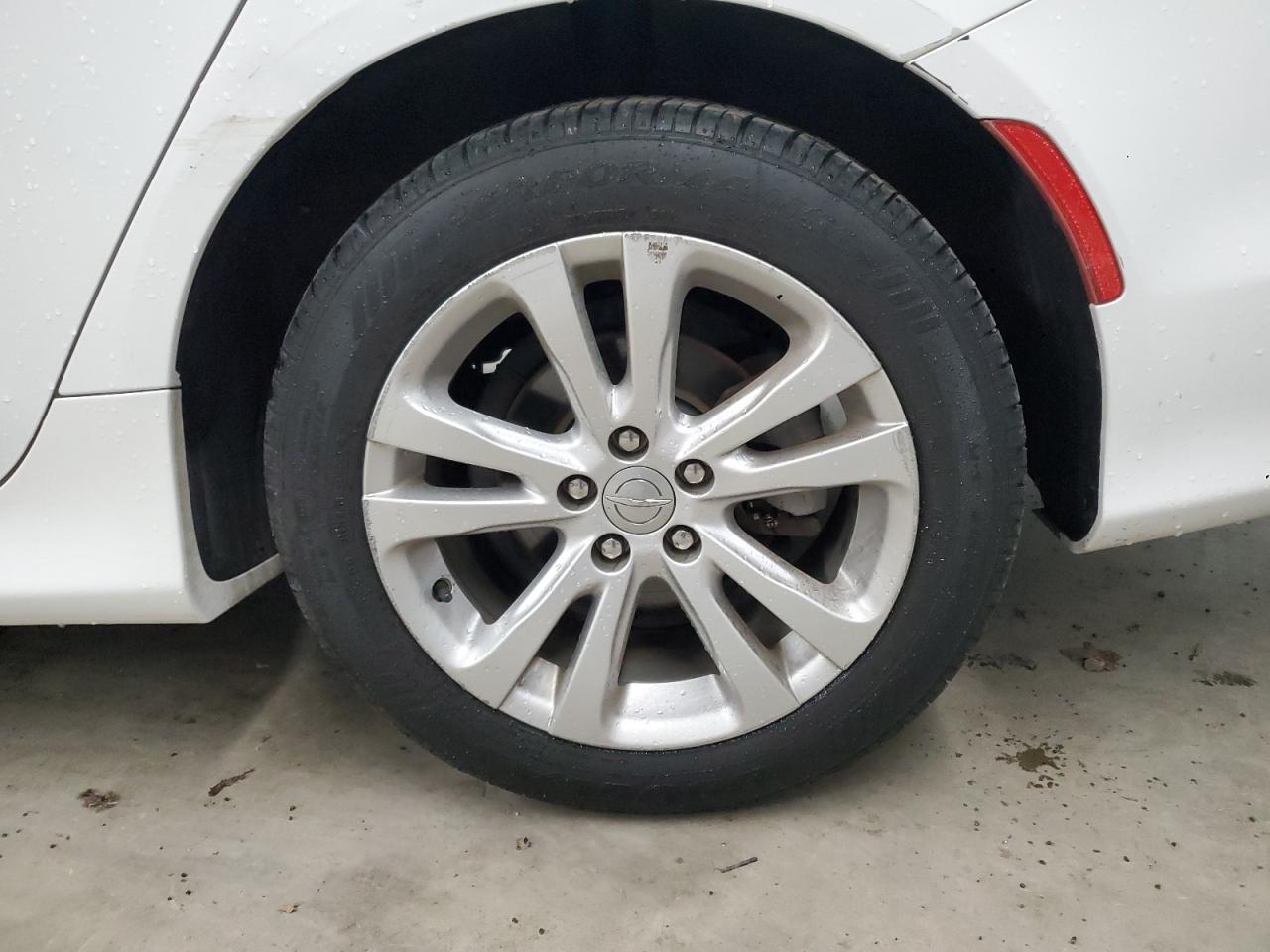 2015 Chrysler 200 Limited White vin: 1C3CCCAB9FN657952 Damage: Left Rear Wheel, Curb Rash, > 12 Inches