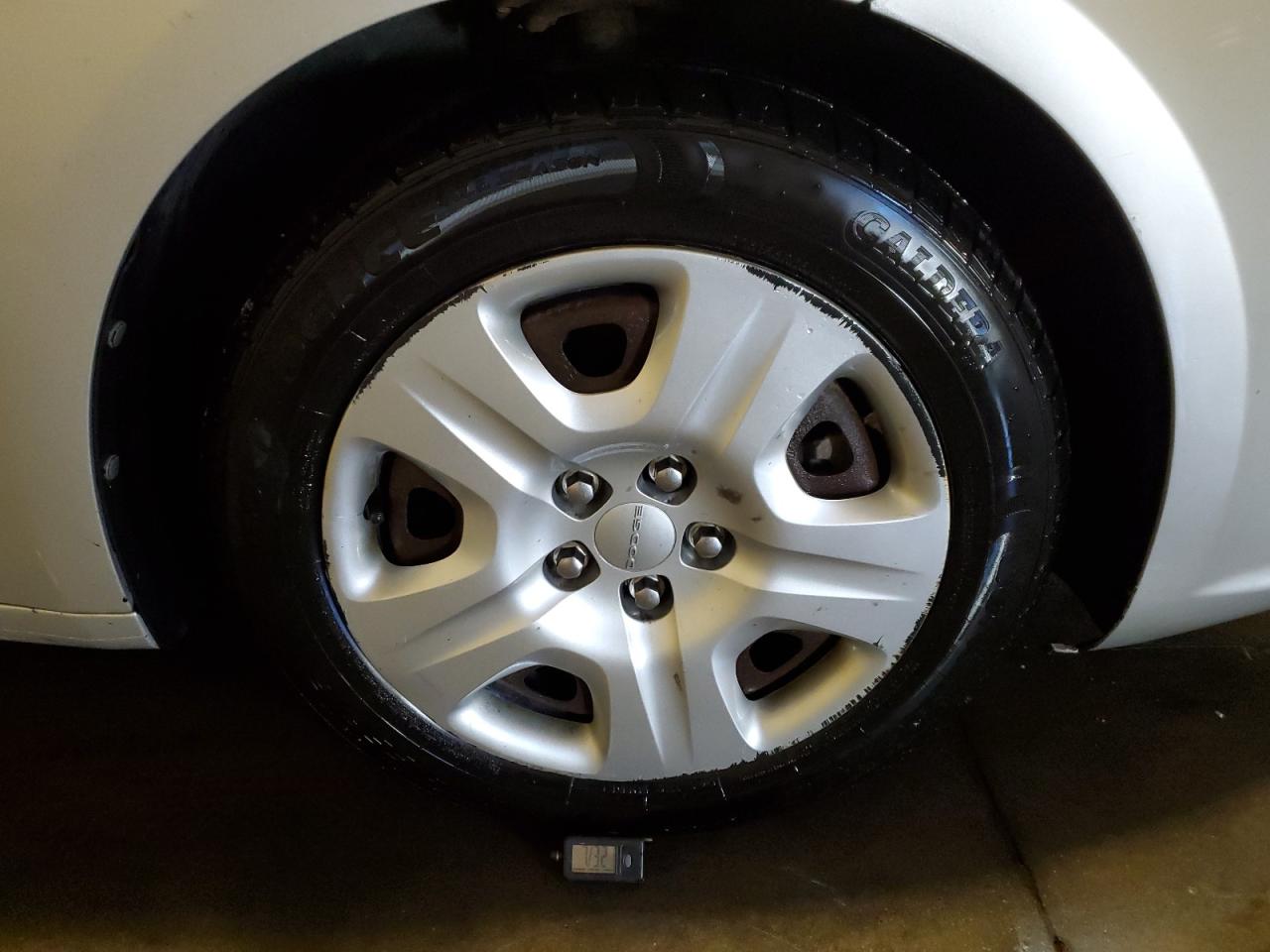 2013 Dodge Dart Se Silver vin: 1C3CDFAA6DD178302 Damage: Right Front Wheel Cover, Curb Rash, > 12 Inches