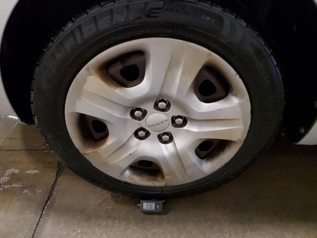 2013 Dodge Dart Se Silver vin: 1C3CDFAA6DD178302 Damage: Right Rear Wheel Cover, Peeling, > 12 Inches