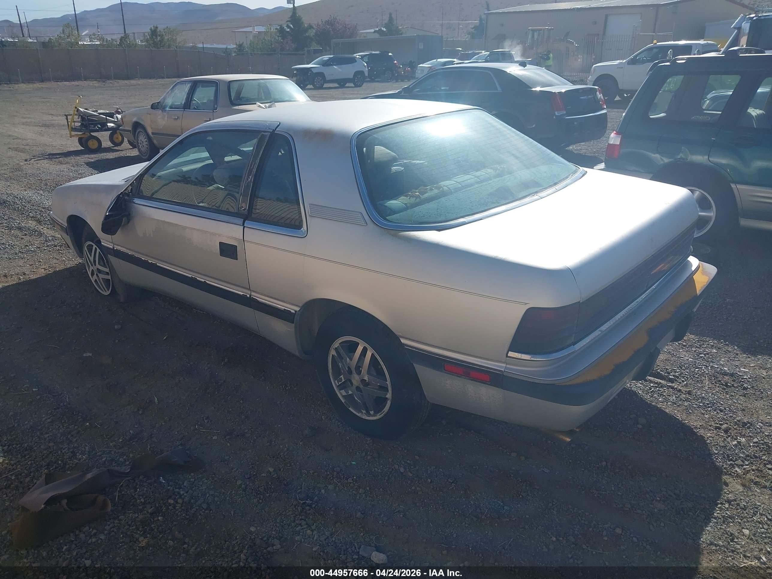 1987 Chrysler Lebaron   Silver vin: 1C3CJ41E7HG196795