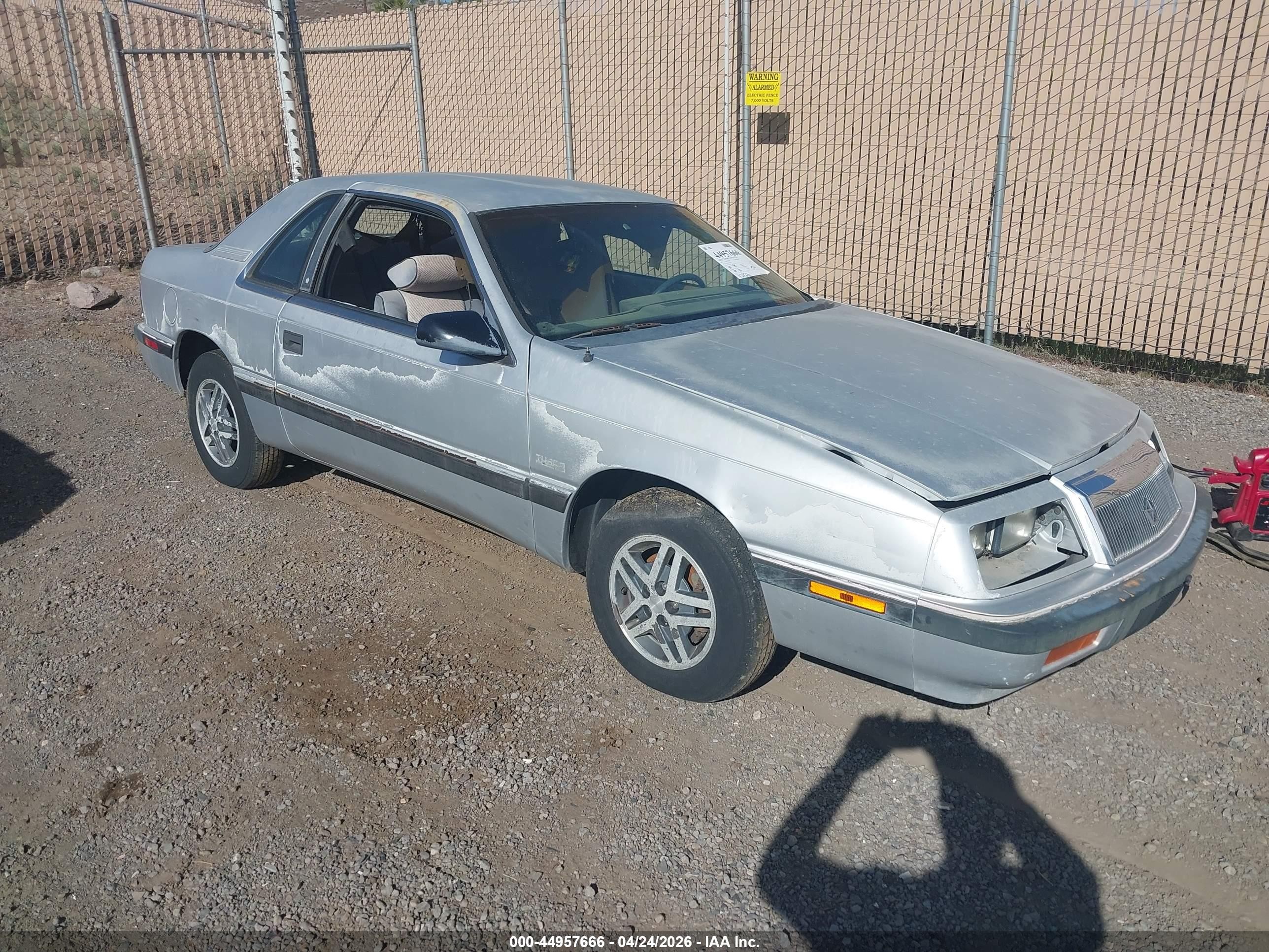 1987 Chrysler Lebaron   Серебряный vin: 1C3CJ41E7HG196795