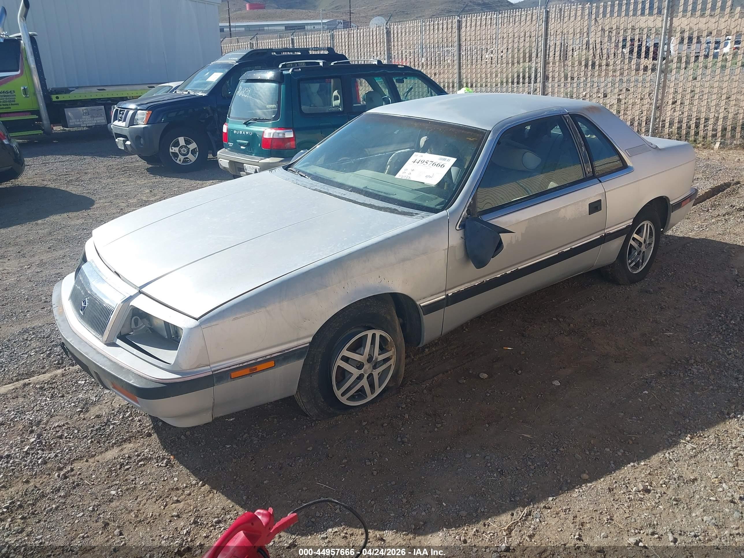 1987 Chrysler Lebaron   Silver vin: 1C3CJ41E7HG196795