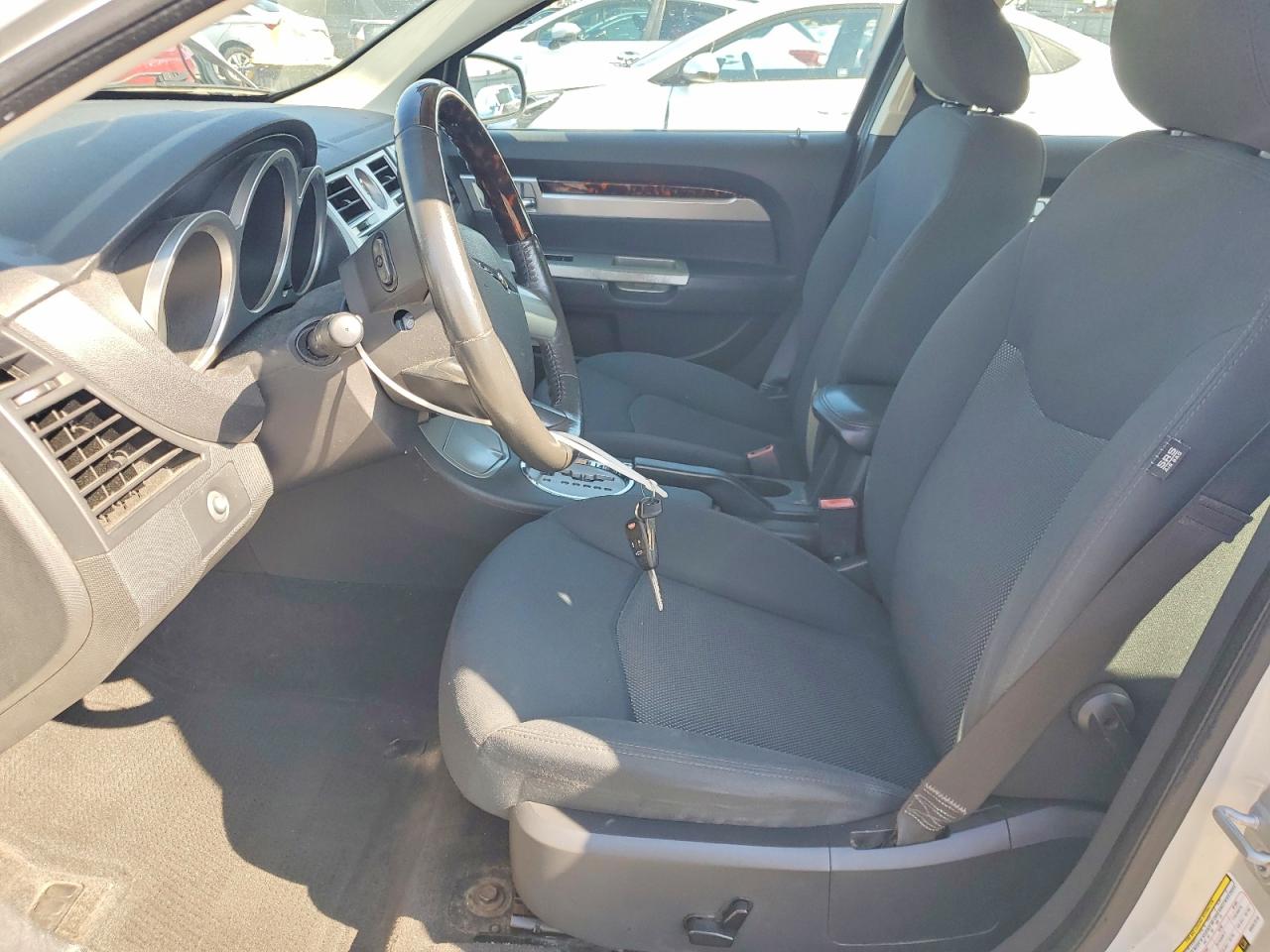 2009 Chrysler Sebring Touring Серебряный vin: 1C3LC56B69N567019