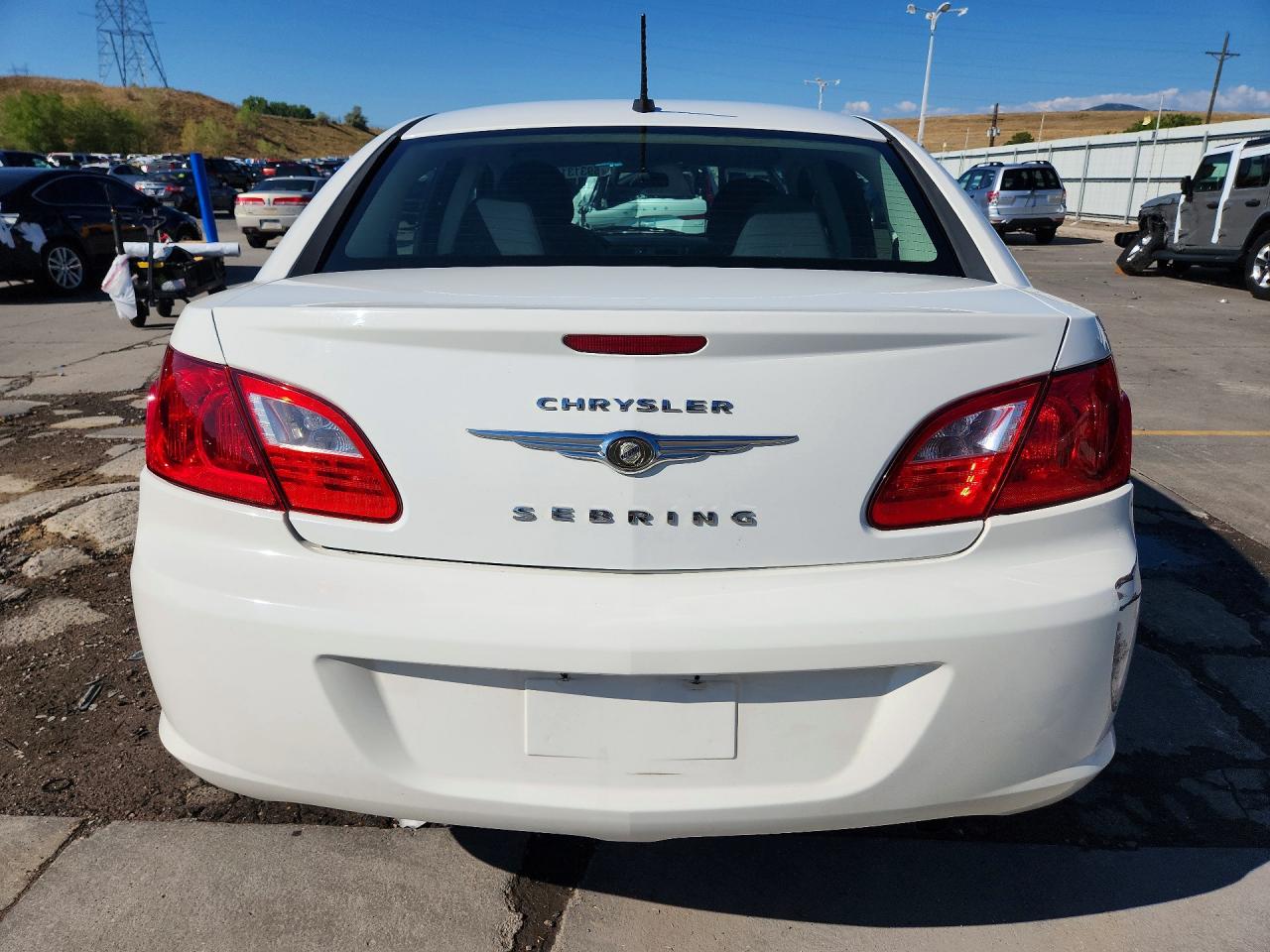 2009 Chrysler Sebring Touring/limited White vin: 1C3LC56BX9N565435
