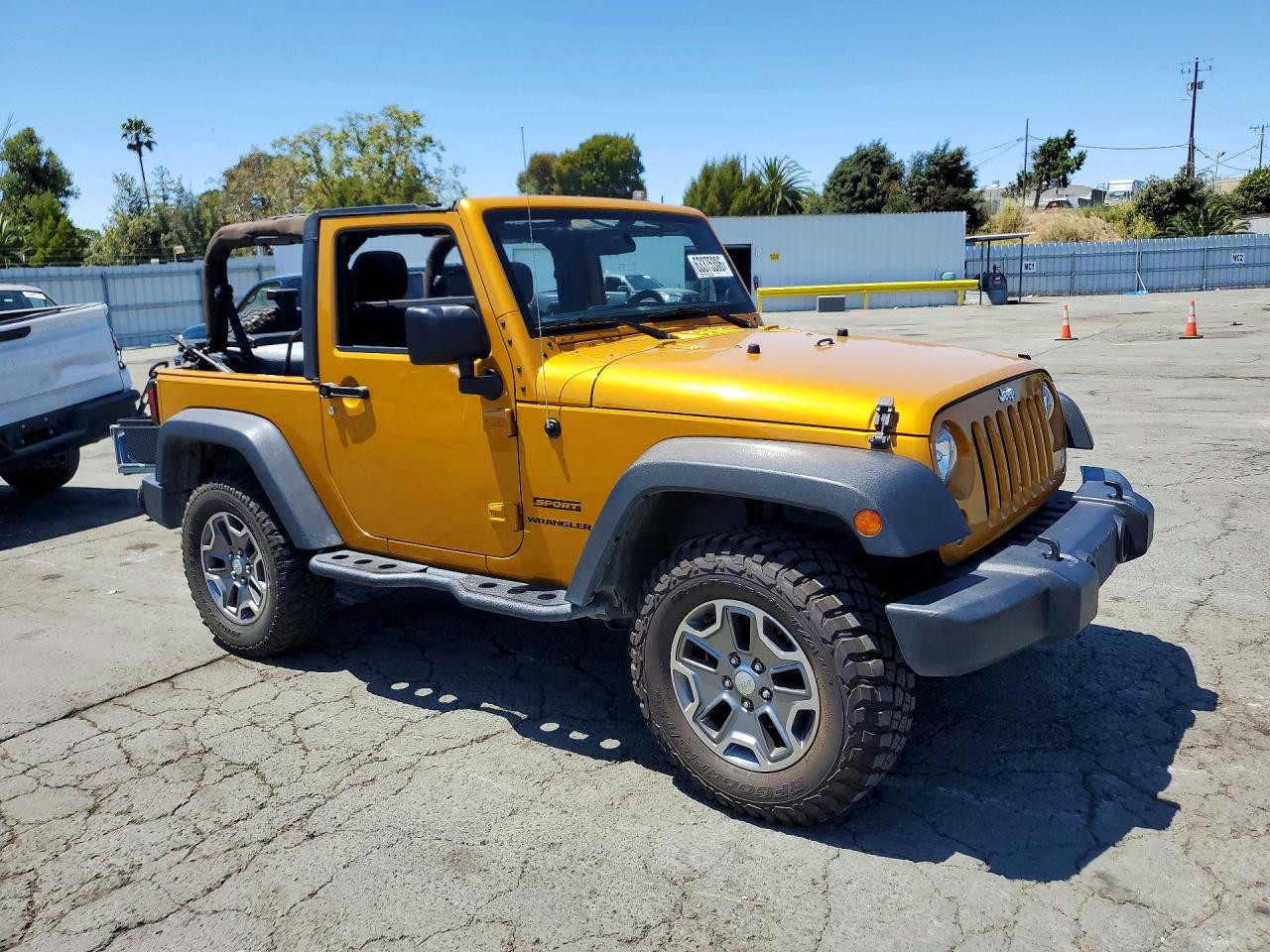 2014 Jeep Wrangler Sport Yellow vin: 1C4AJWAG0EL192588