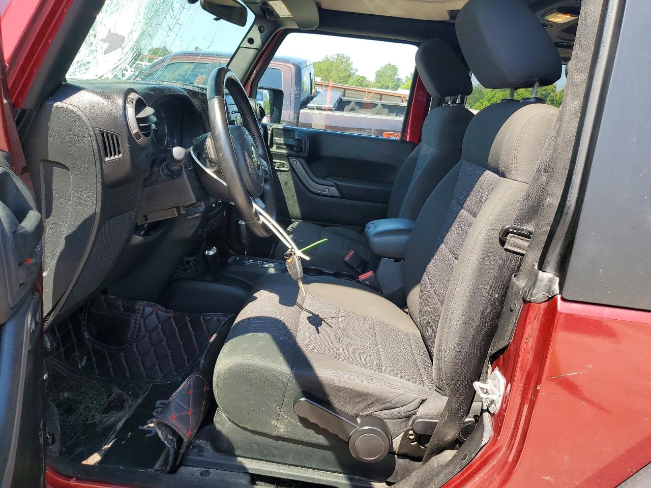 2012 Jeep Wrangler Sport Burgundy vin: 1C4AJWAG2CL184599