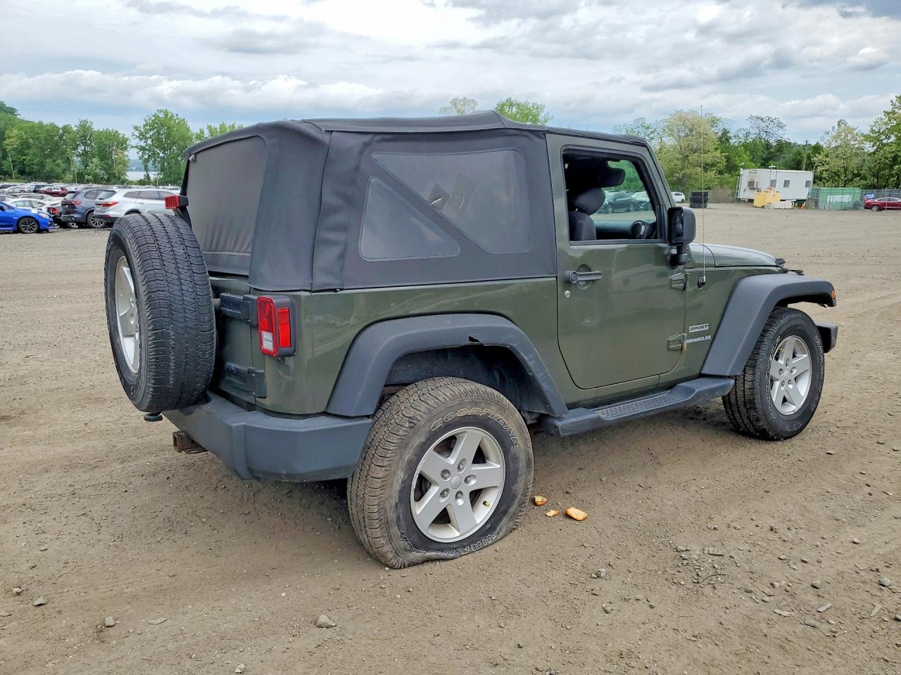 2015 Jeep Wrangler Sport Green vin: 1C4AJWAG2FL690938