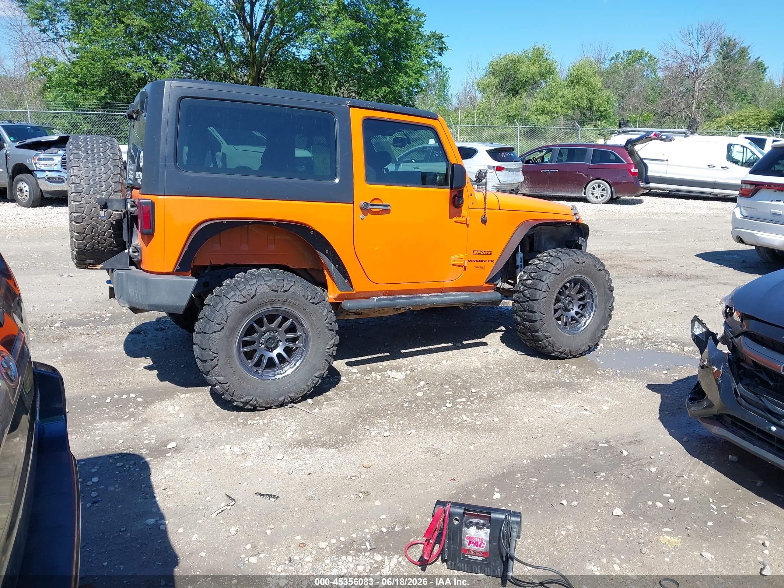 2013 Jeep Wrangler Sport Orange vin: 1C4AJWAG3DL545159
