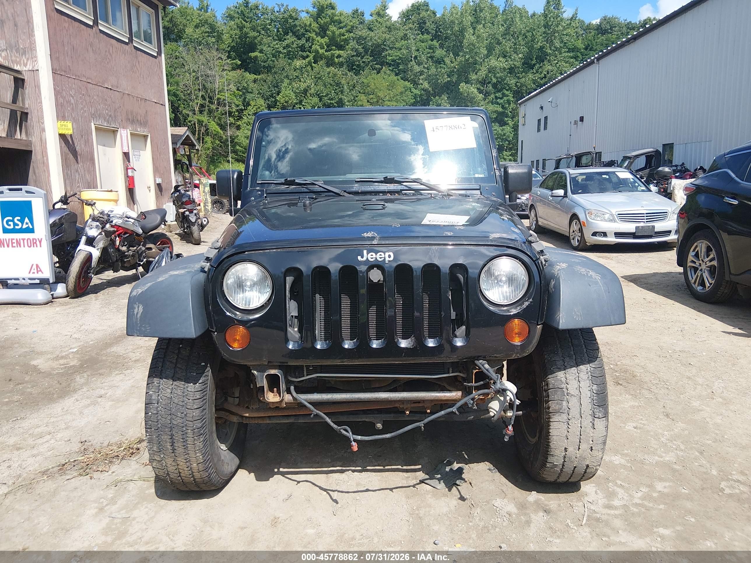 2012 Jeep Wrangler Sport Black vin: 1C4AJWAG5CL256184