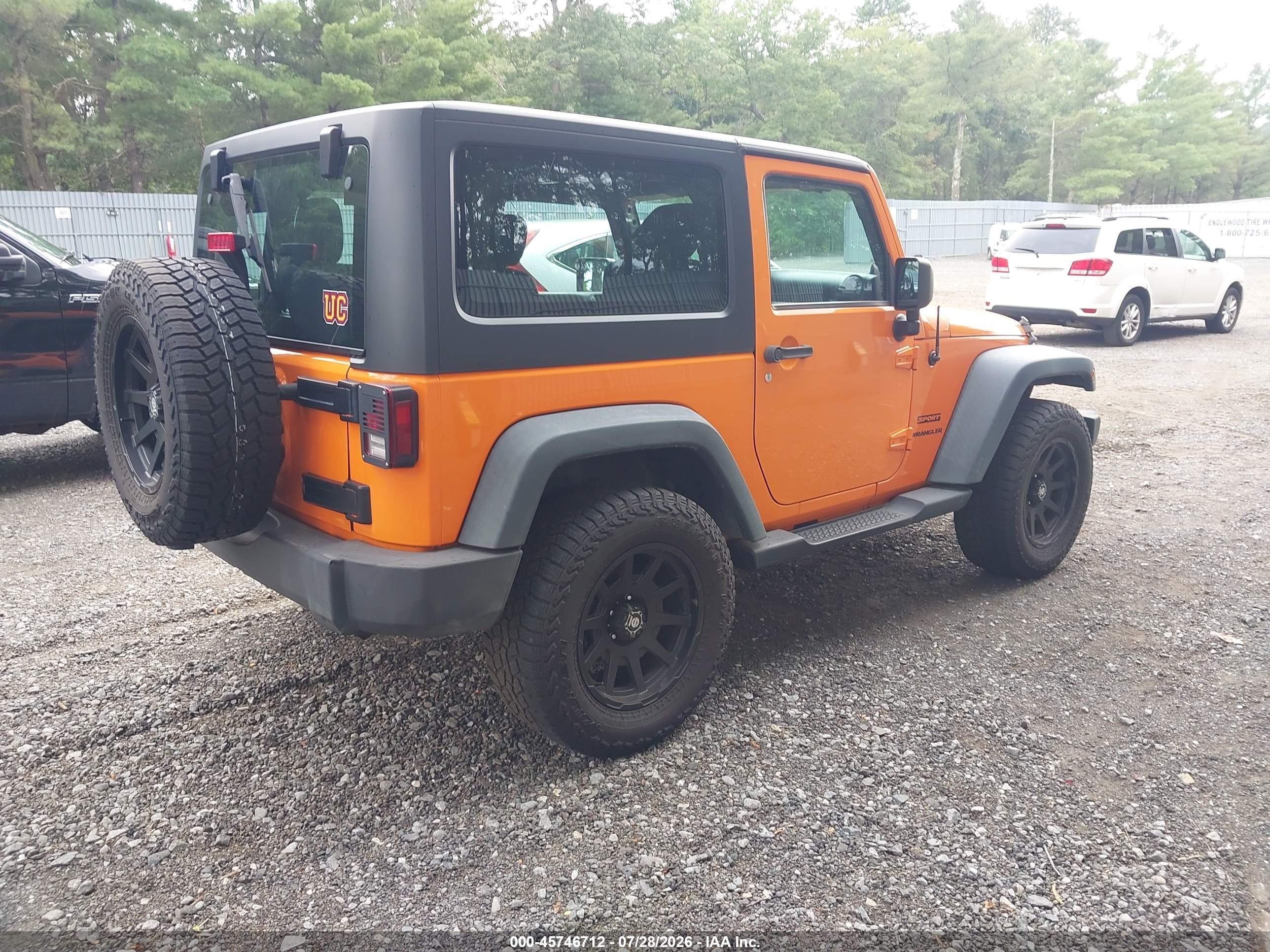 2012 Jeep Wrangler Sport Orange vin: 1C4AJWAG5CL279755