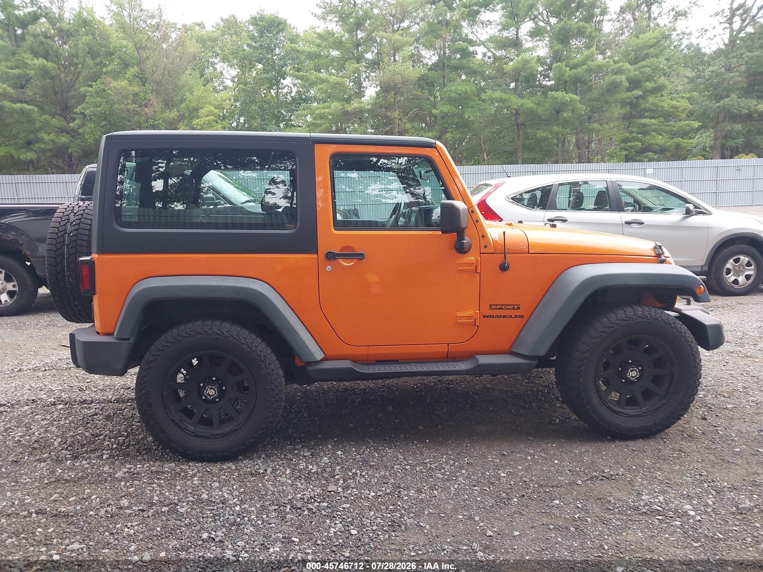 2012 Jeep Wrangler Sport Orange vin: 1C4AJWAG5CL279755