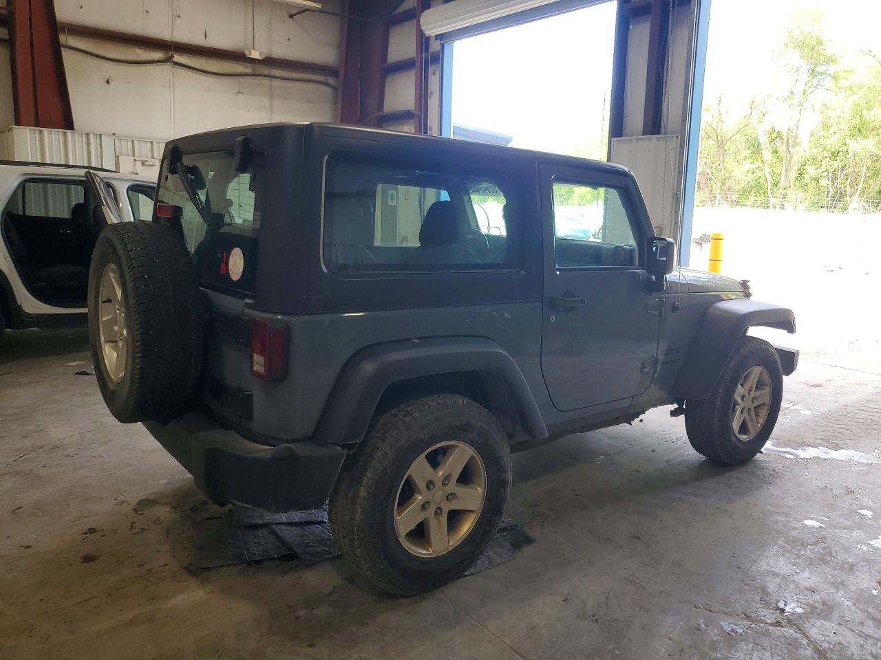 2015 Jeep Wrangler Sport Teal vin: 1C4AJWAG5FL539690
