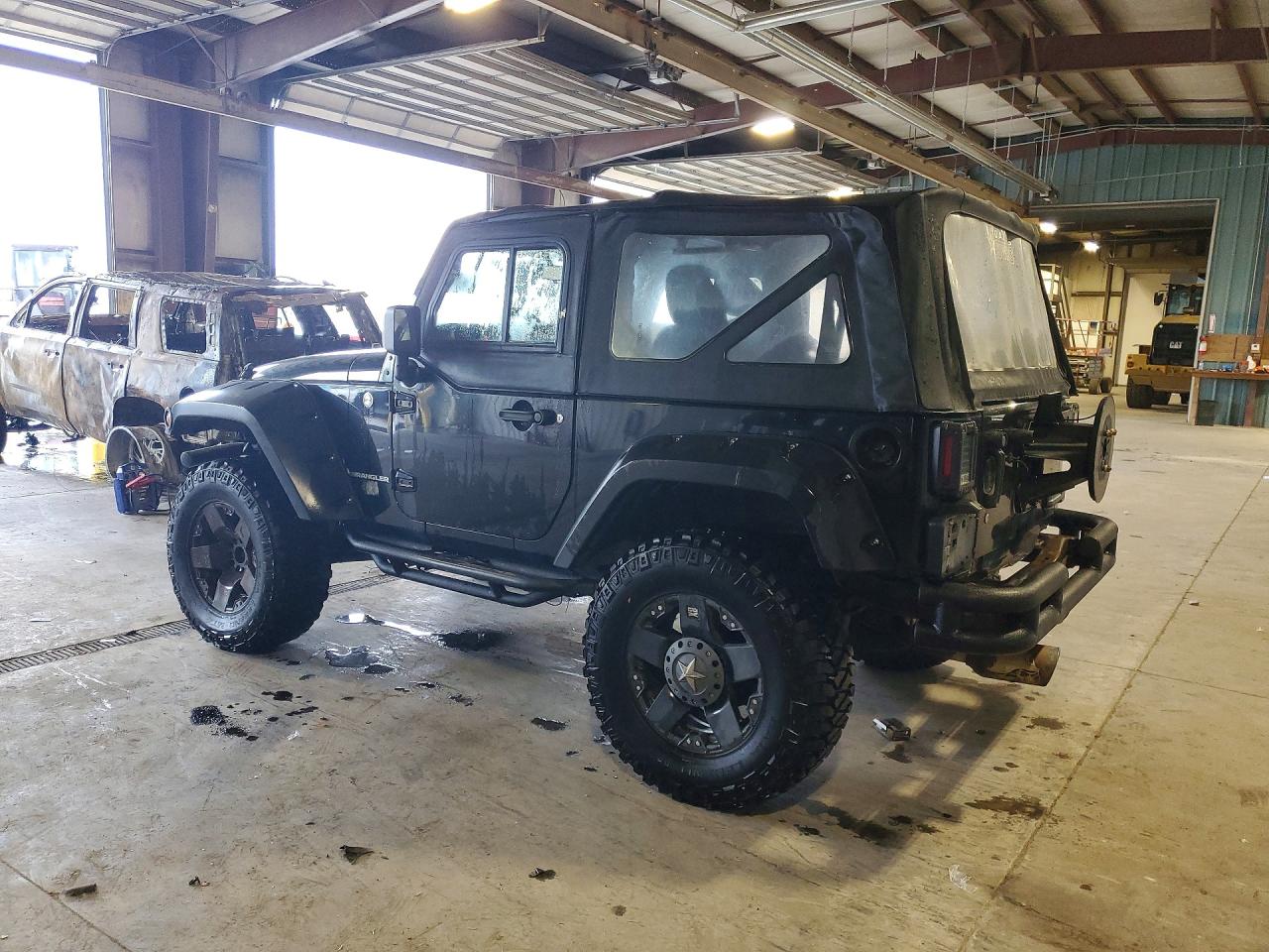 2012 Jeep Wrangler Sport Black vin: 1C4AJWAG8CL243297